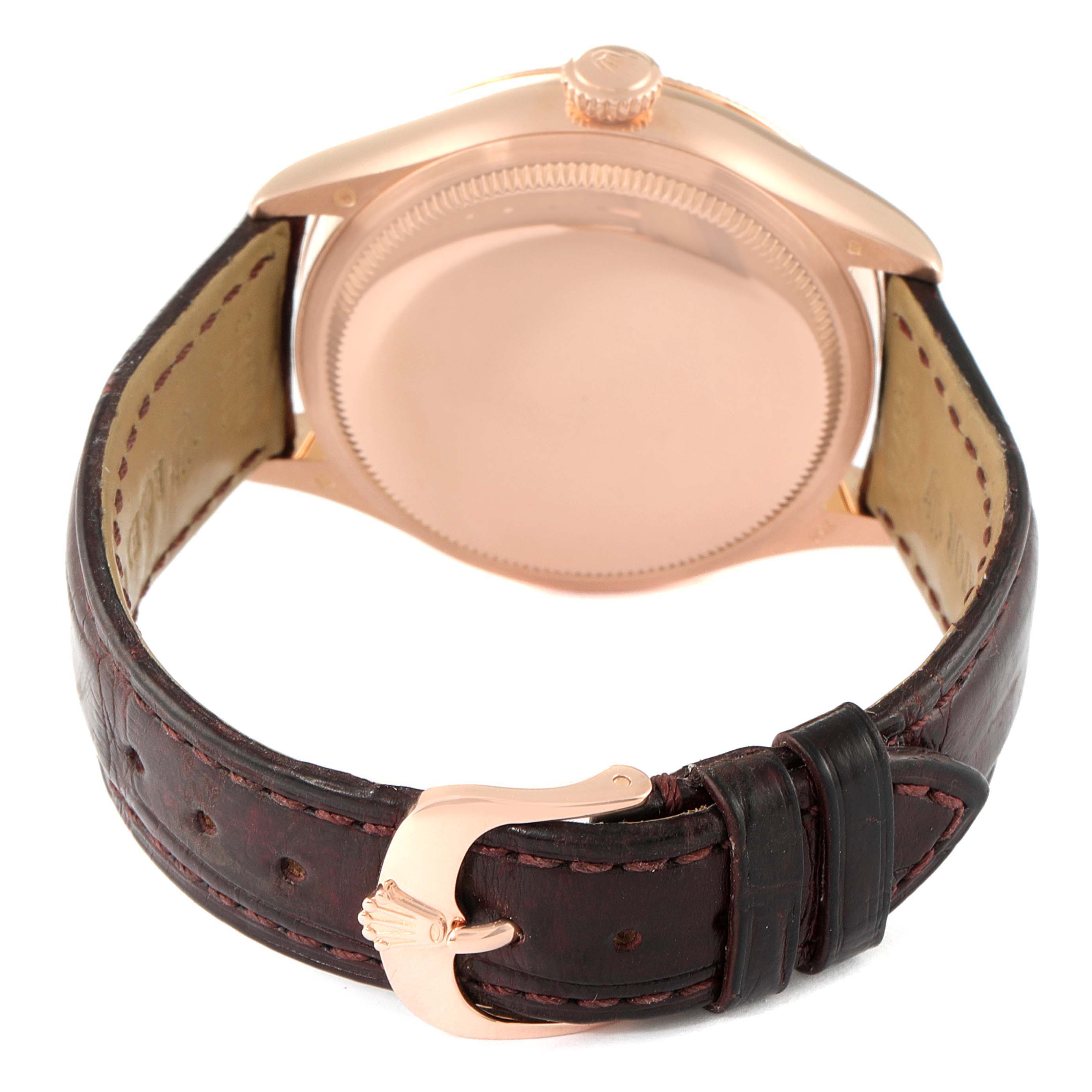 The image shows the back of the Rolex Cellini 50515 Men's Rose Gold Silver Dial 50515 Men's Rose Gold Silver Dial watch, highlighting the case back, crown, and leather strap with a buckle.