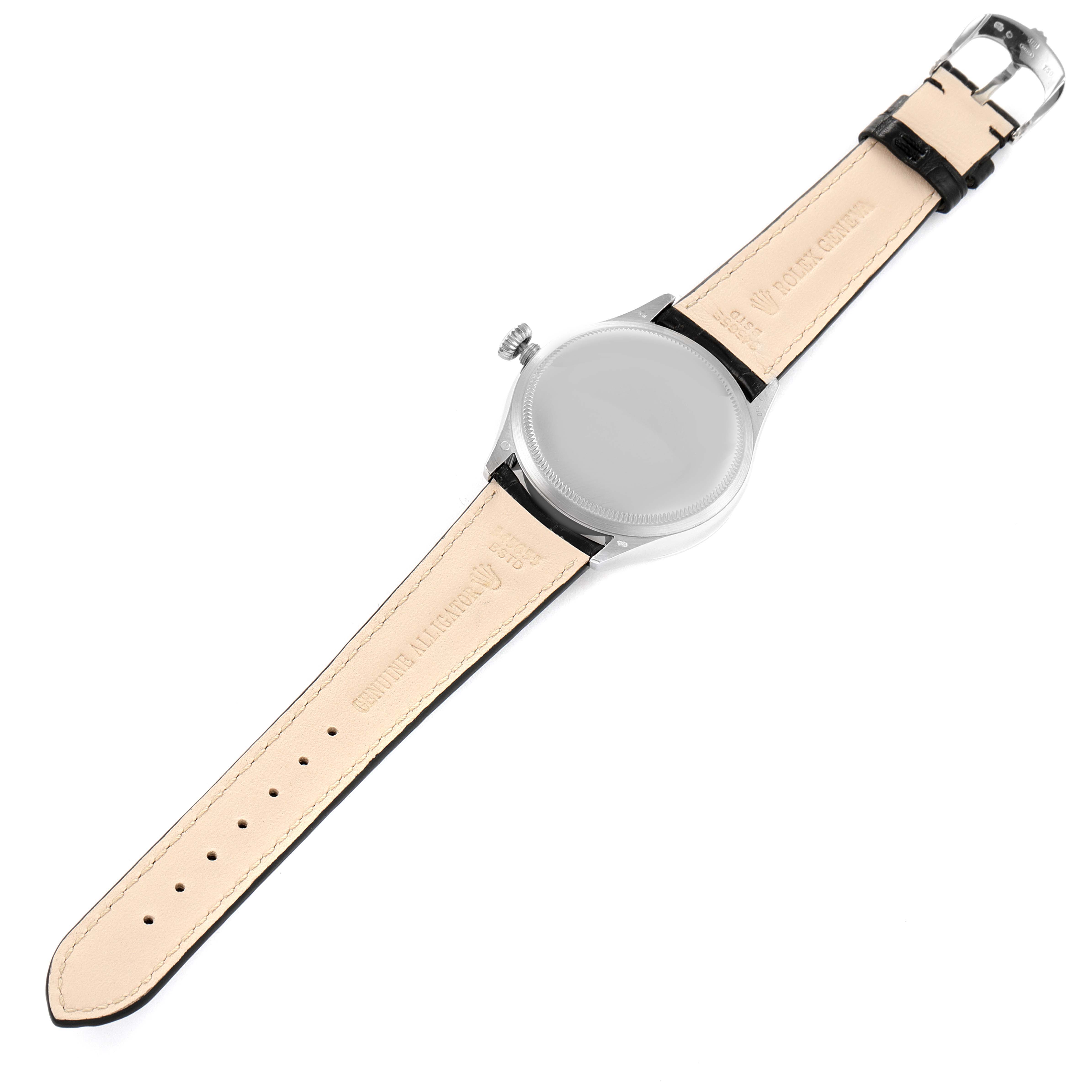 The image shows the back of a Rolex Cellini 50519 Men's White Gold Black Dial 50519 Men's White Gold Black Dial watch at an angle, featuring the leather straps and the watch's case back.