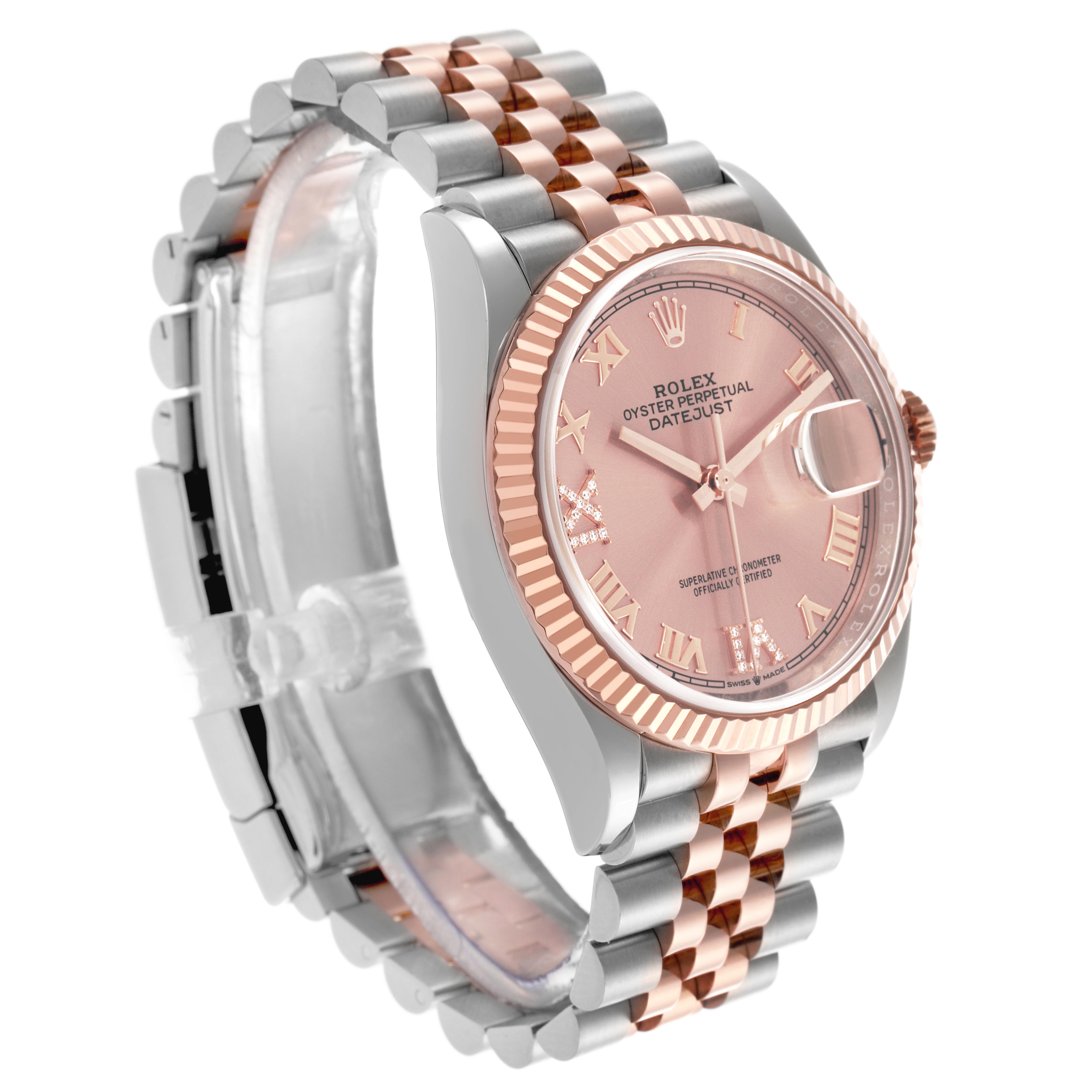 The Rolex Datejust 126231 Men's Steel and Gold (two tone) Pink Dial 126231 Men's Steel and Gold (two tone) Pink Dial watch is shown at a side angle, highlighting the dial, bezel, and two-tone bracelet.
