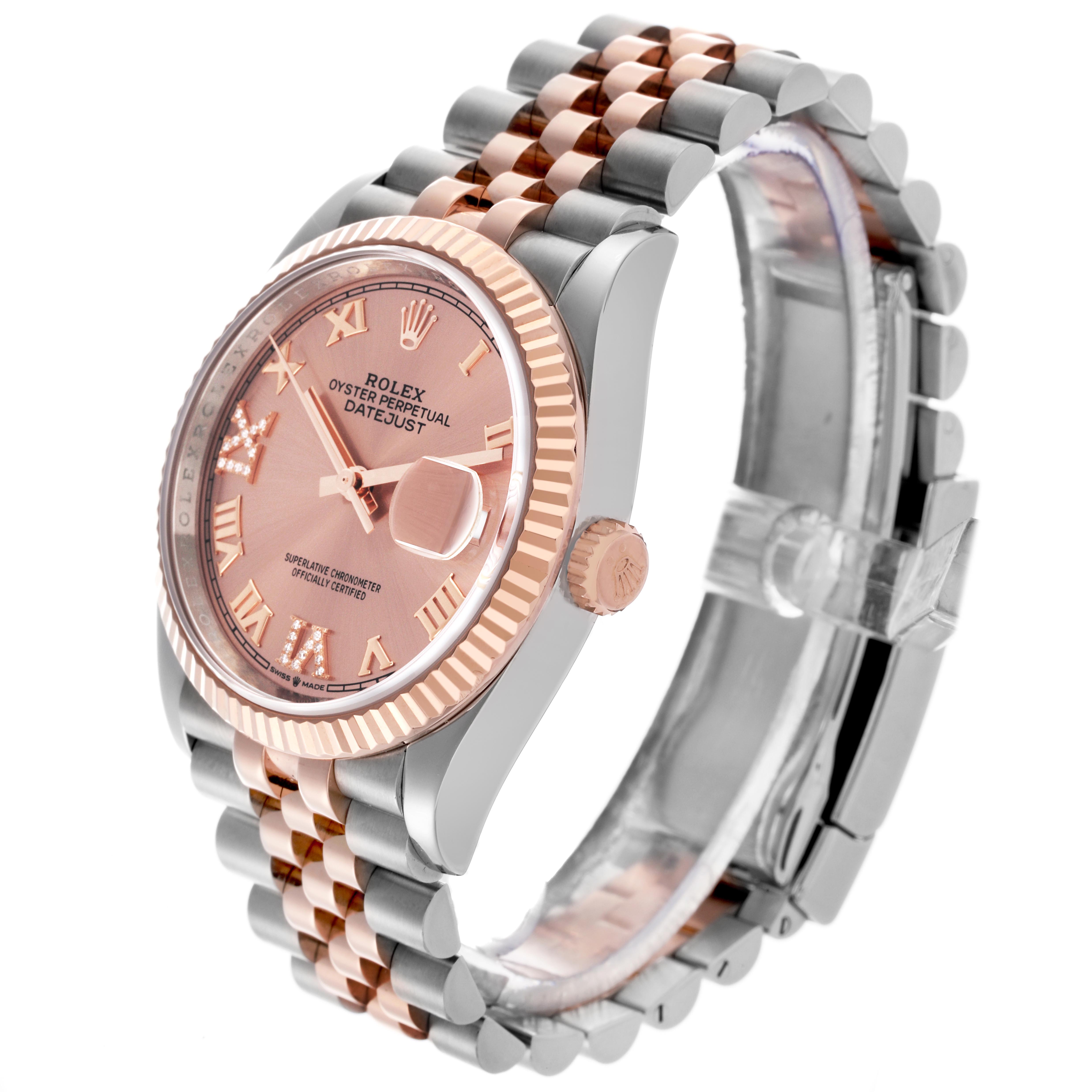 The Rolex Datejust 126231 Men's Steel and Gold (two tone) Pink Dial 126231 Men's Steel and Gold (two tone) Pink Dial watch is shown at an angled side view, highlighting its bezel, crown, dial, and Jubilee bracelet.