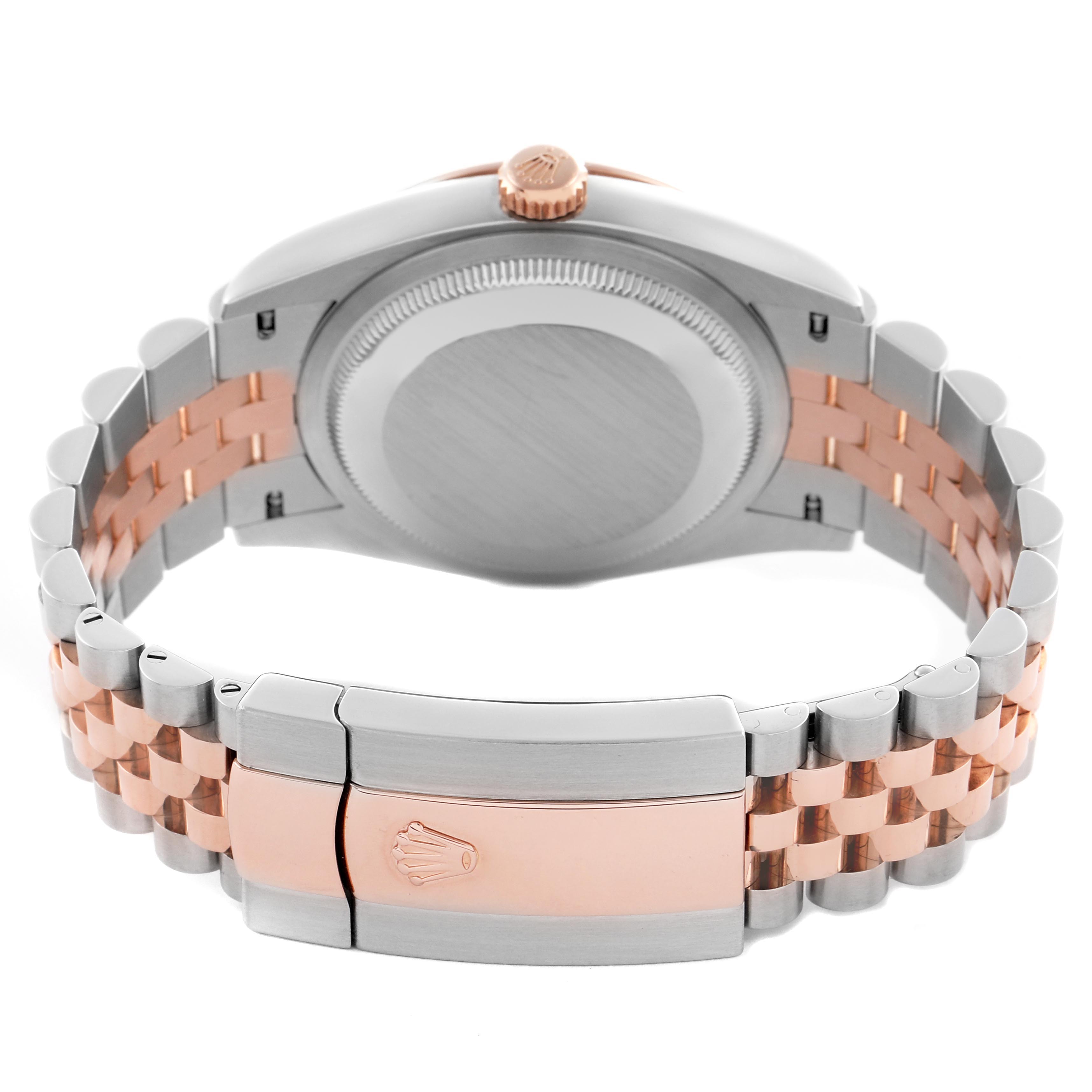 The image shows the back view of a Rolex Datejust 126231 Men's Steel and Gold (two tone) Pink Dial 126231 Men's Steel and Gold (two tone) Pink Dial watch, highlighting the clasp and two-tone bracelet.