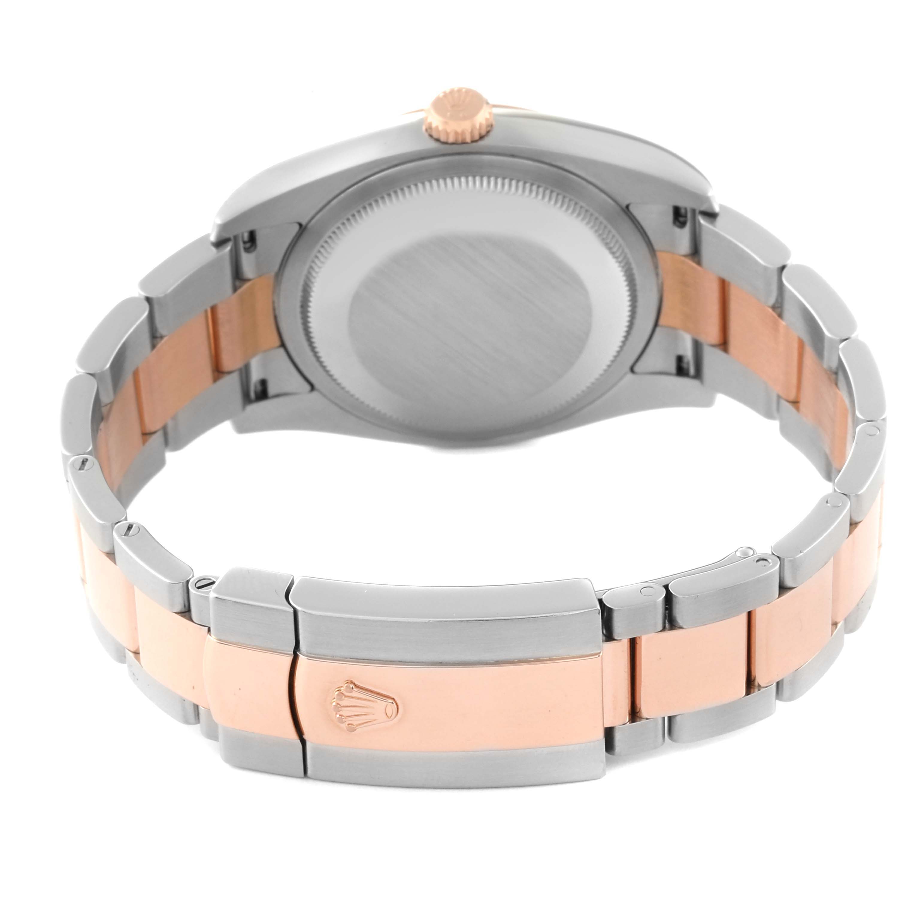 The image shows the back view of a Rolex Datejust 116201 Men's Steel and Gold (two tone) Black Dial 116201 Men's Steel and Gold (two tone) Black Dial watch, highlighting the case back and the two-tone metal bracelet clasp.