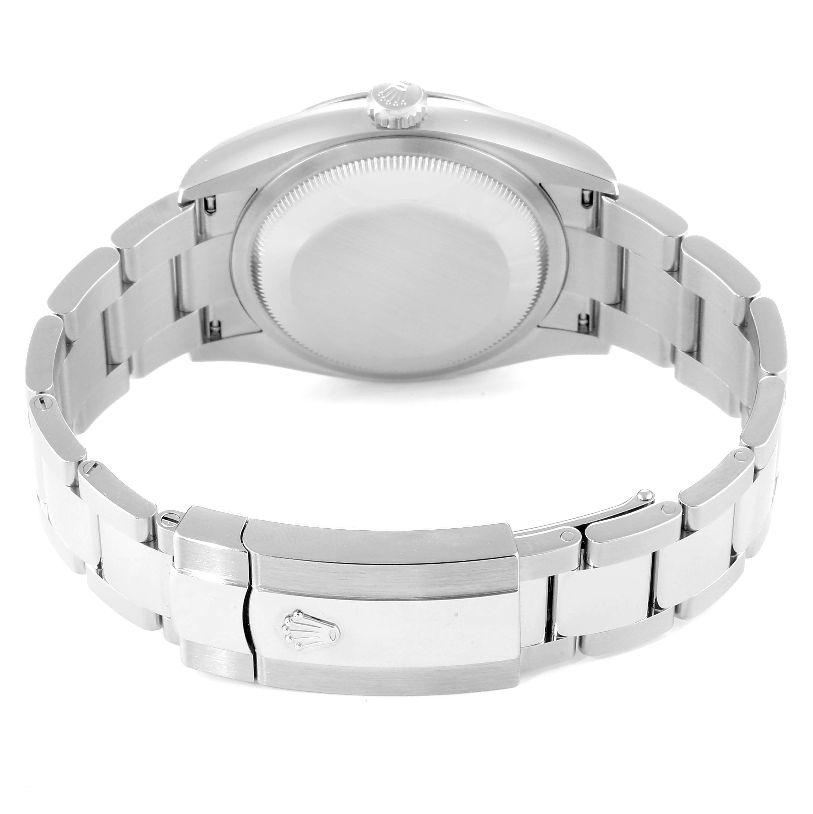 This image shows the back case and bracelet of a Rolex Datejust 126200 Men's Stainless Steel White Dial 126200 Men's Stainless Steel White Dial watch, focusing on the clasp and links.
