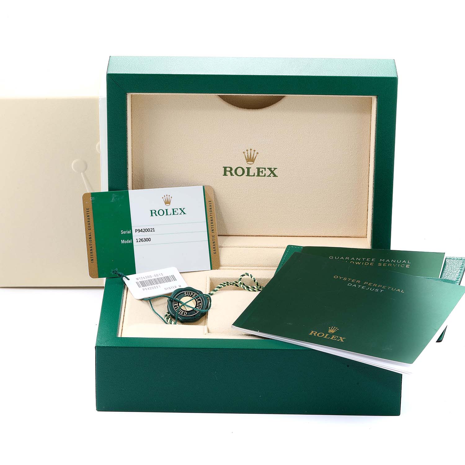 This image shows the packaging and accessories of a Rolex Datejust 41 126300 Men
s Stainless Steel Grey Dial 126300 Men
s Stainless Steel Grey Dial, including manuals, warranty card, and box from a front angle.