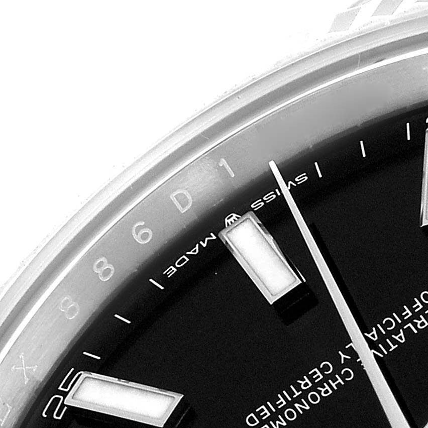This image shows a close-up angle of the dial and part of the bezel of a Rolex Datejust 41 126334 Men
s Stainless Steel Black Dial 126334 Men
s Stainless Steel Black Dial watch.