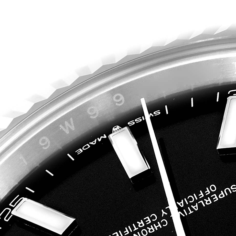 The image shows a close-up of the Rolex Datejust 41 126334 Men
s Stainless Steel Black Dial 126334 Men
s Stainless Steel Black Dial
s dial and part of the fluted bezel.