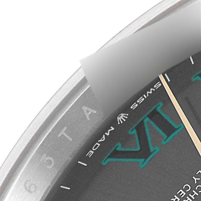 The image shows a close-up angle of a Rolex Datejust 41 126303 Men's Steel and Gold (two tone) Grey Dial 126303 Men's Steel and Gold (two tone) Grey Dial, highlighting part of the dial and the "Swiss Made" label.