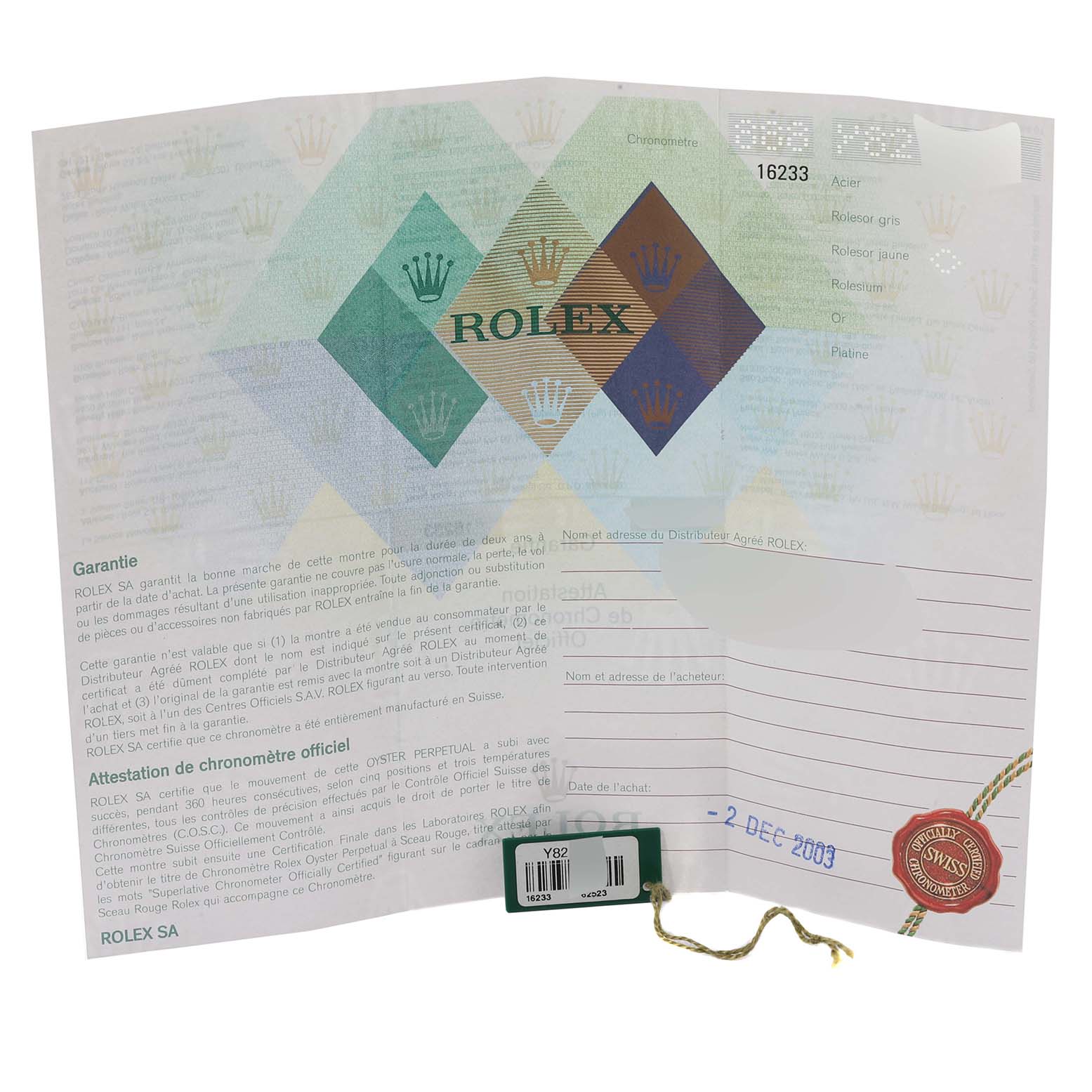 This image shows a warranty booklet and certificate for the Rolex Datejust 16233 Men's Steel and Gold (two tone) Silver Dial 16233 Men's Steel and Gold (two tone) Silver Dial model.