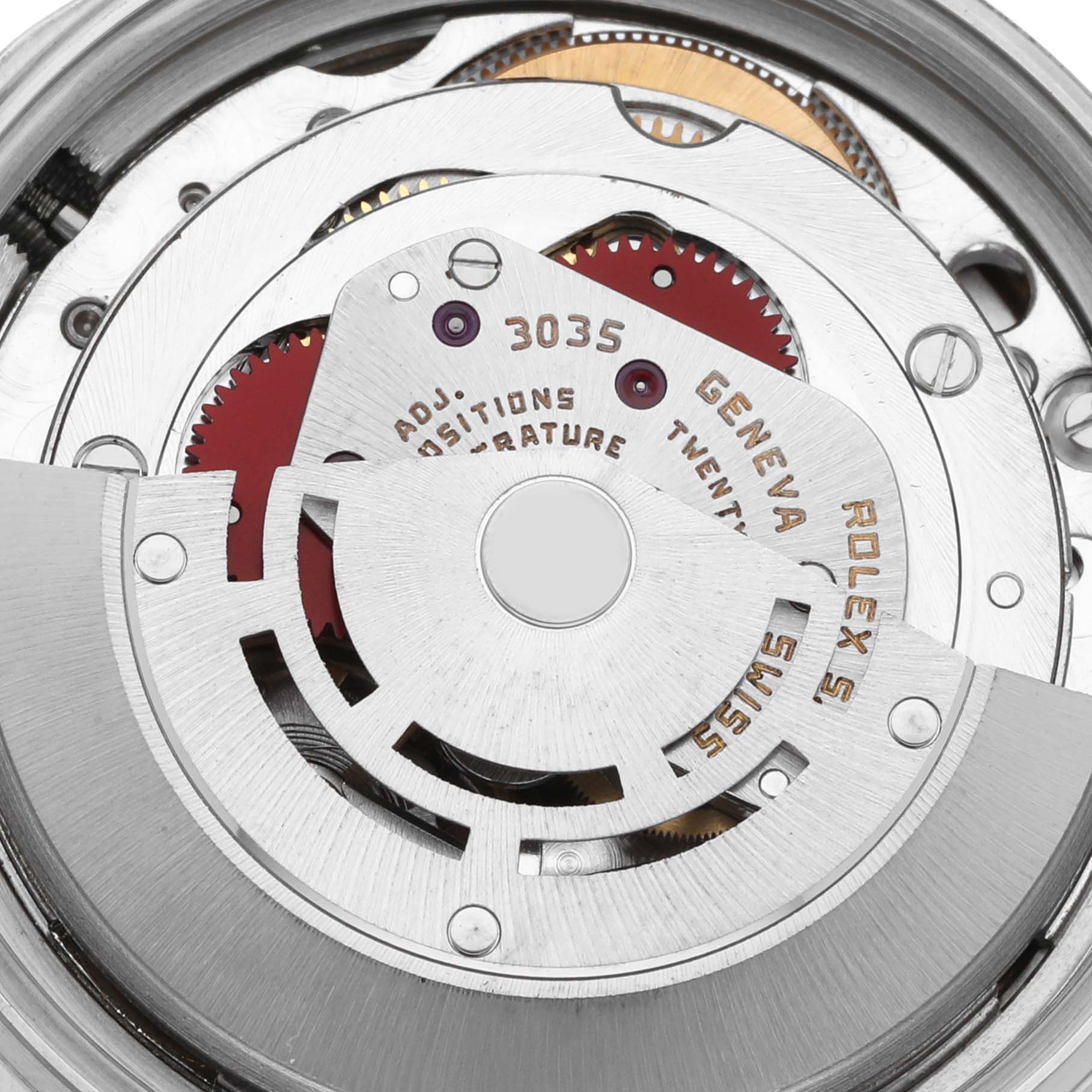 The image shows the movement of a Rolex Datejust 16030 Men's Stainless Steel Silver Dial 16030 Men's Stainless Steel Silver Dial, focusing on the intricate gear and rotor mechanism.