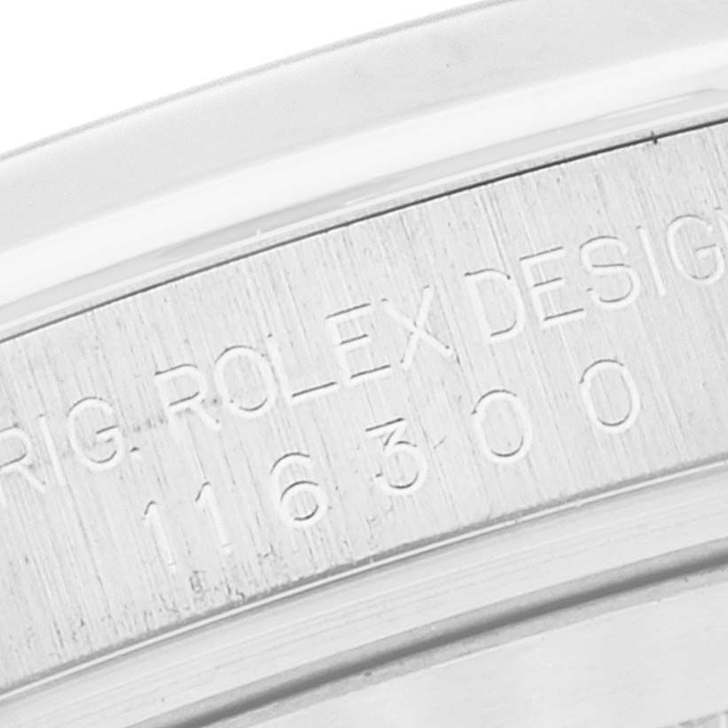 This is a close-up of the engraving on the case's inner rim of a Rolex Datejust 41 116300 Men's Stainless Steel Blue Dial 116300 Men's Stainless Steel Blue Dial watch.