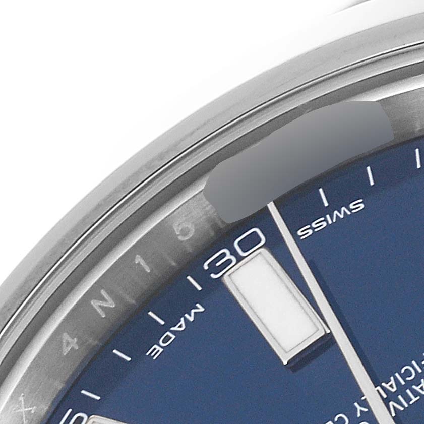 This image shows a close-up of the dial and bezel of a Rolex Datejust 41 116300 Men's Stainless Steel Blue Dial 116300 Men's Stainless Steel Blue Dial watch.