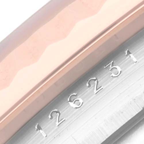 This image shows a close-up of the bezel and case edge of a Rolex Datejust 126231 Men's Steel and Gold (two tone) Mother of Pearl Dial 126231 Men's Steel and Gold (two tone) Mother of Pearl Dial watch, highlighting its model number.