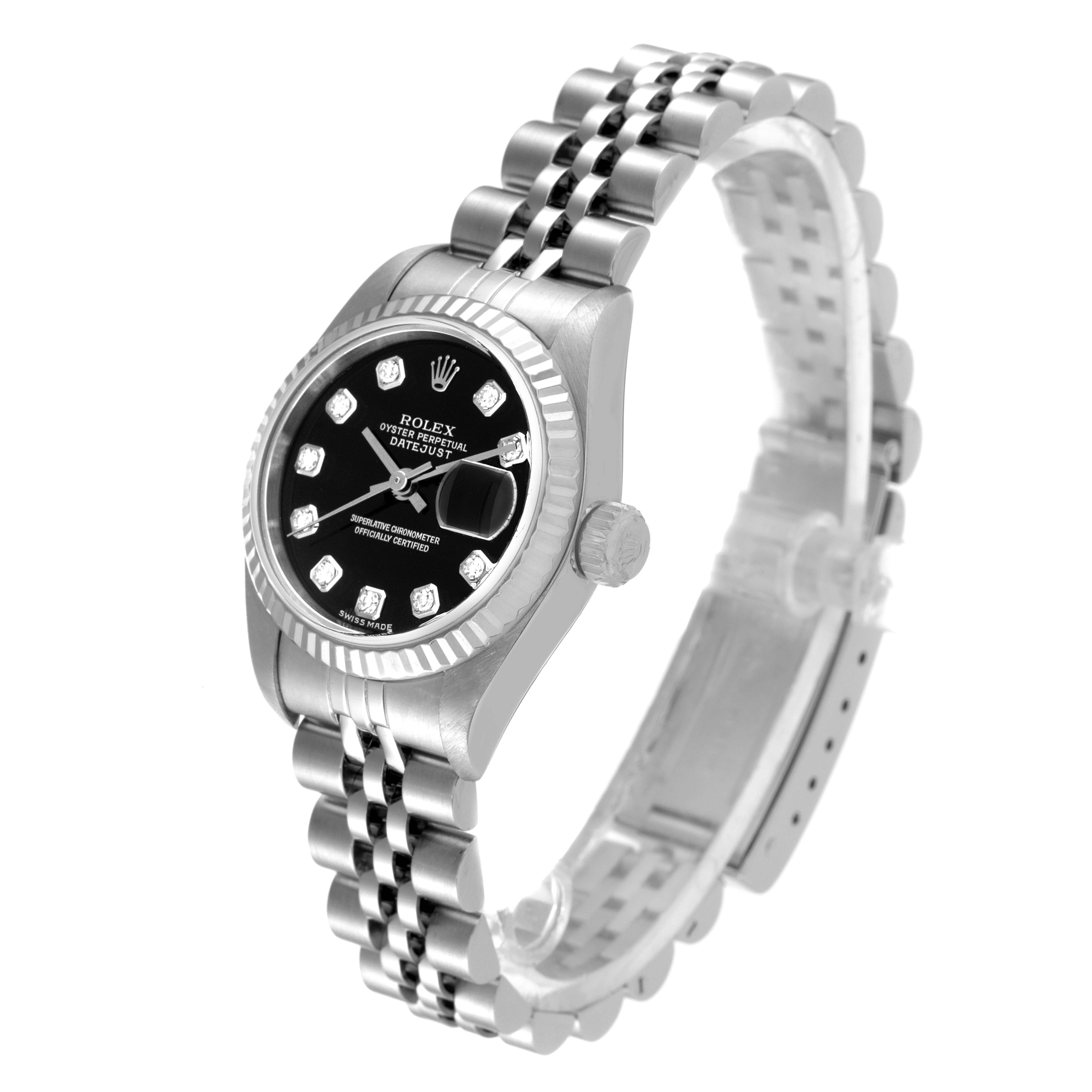 This image shows a Rolex Datejust 79174 Women's Stainless Steel Black Dial 79174 Women's Stainless Steel Black Dial watch angled to display the face, crown, and two-thirds of the bracelet.