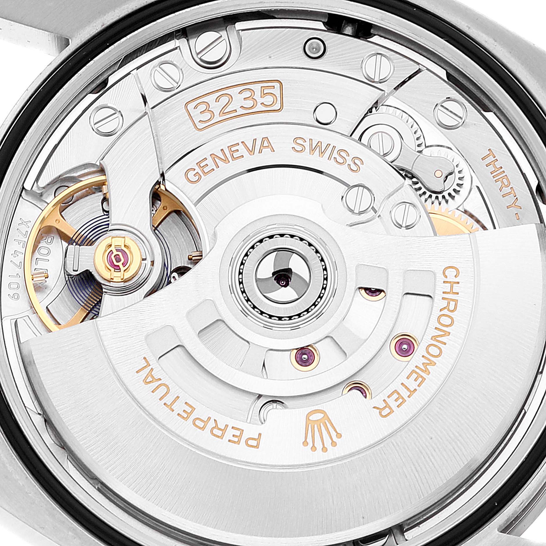 The image shows a close-up of the movement mechanism of a Rolex Datejust 126234 Men's Stainless Steel Green Dial 126234 Men's Stainless Steel Green Dial watch, model 3235.