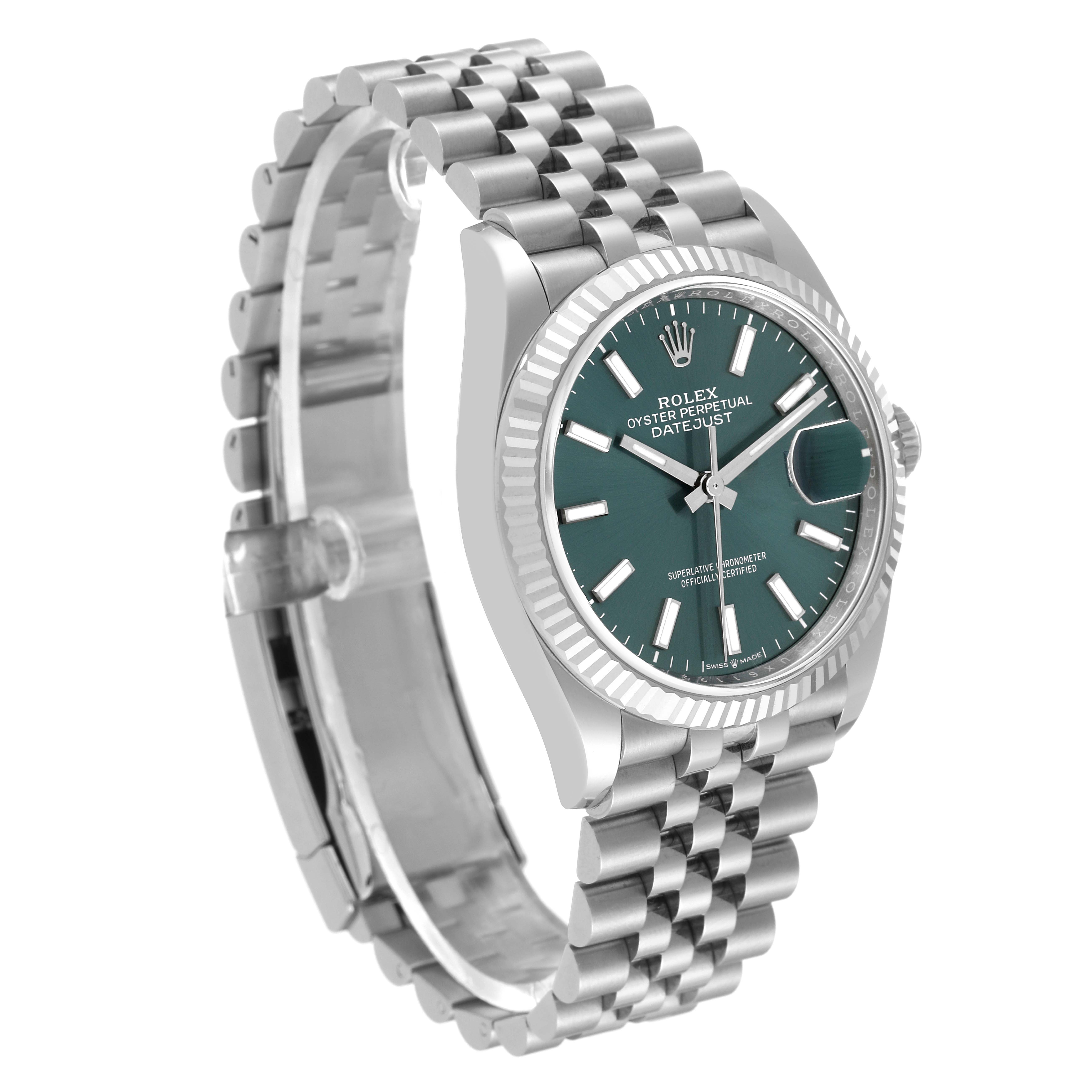 The image shows a Rolex Datejust 126234 Men's Stainless Steel Green Dial 126234 Men's Stainless Steel Green Dial watch at a three-quarter angle displaying its dial, fluted bezel, and Jubilee bracelet.