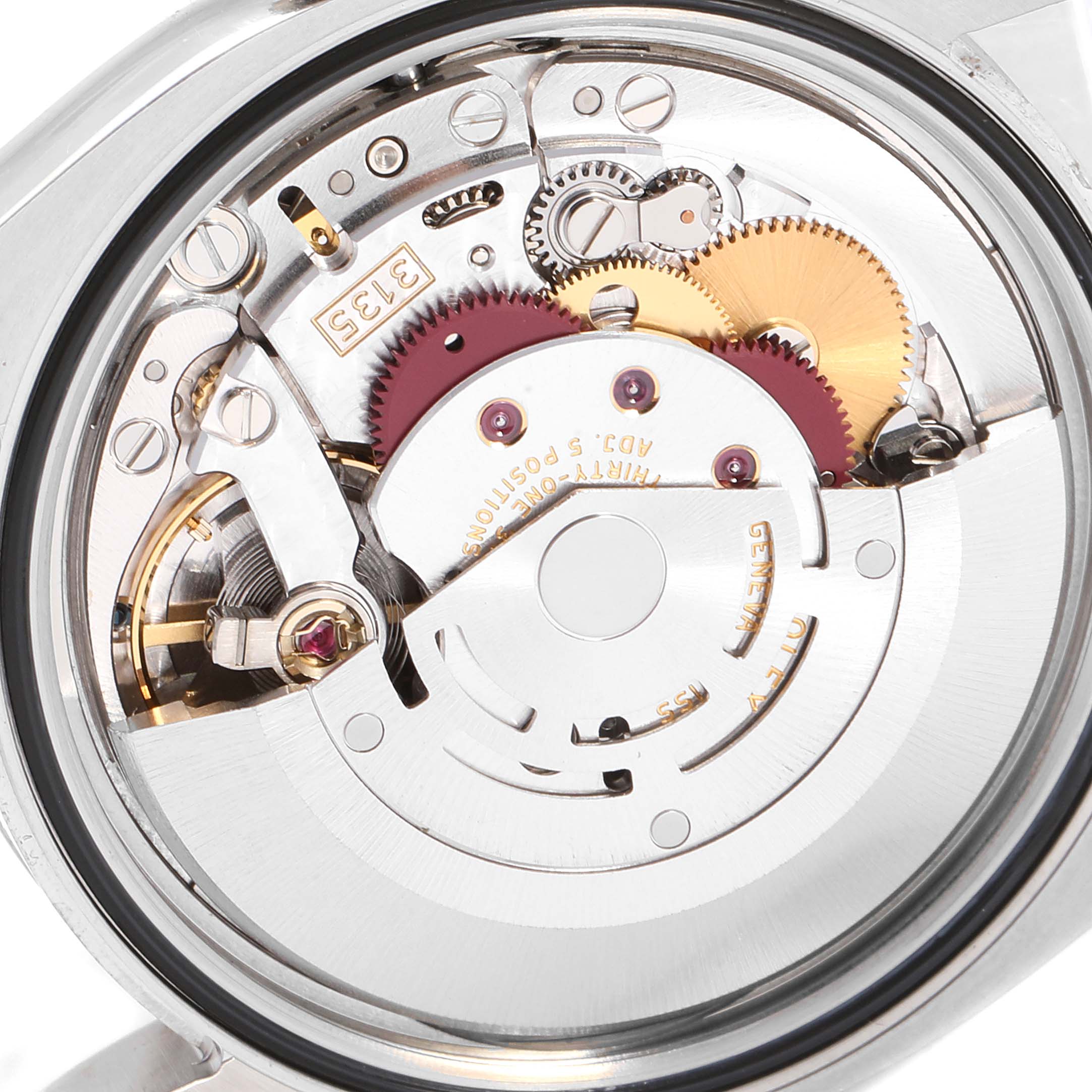The image shows the inner mechanical movement of a Rolex Datejust 116234 Men's Stainless Steel White Dial 116234 Men's Stainless Steel White Dial watch from a close-up, rear angle.