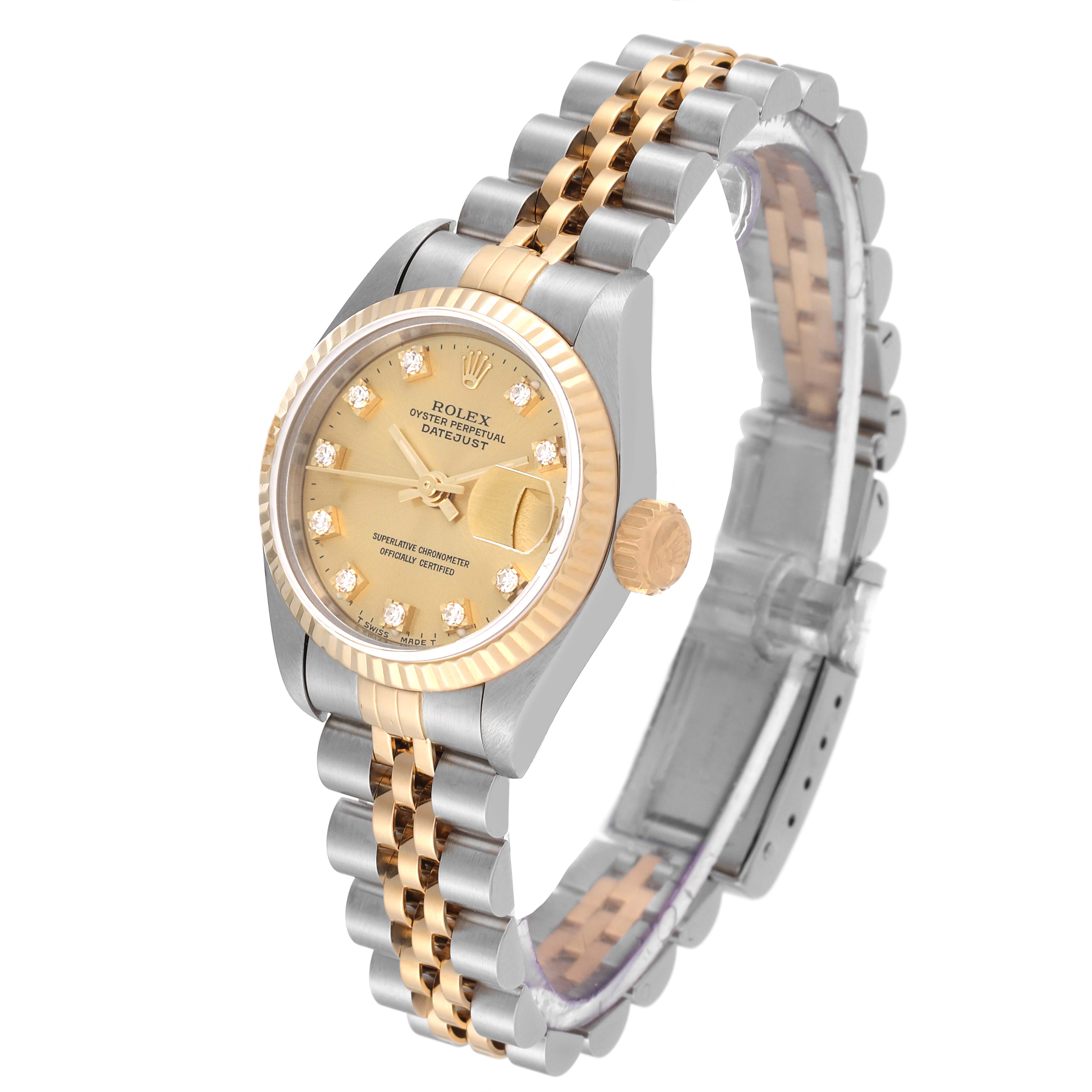 The image shows a Rolex Datejust 69173 Women's Steel and Gold (two tone) Champagne Dial 69173 Women's Steel and Gold (two tone) Champagne Dial model watch from an angled overhead view, highlighting the dial, bezel, crown, and bracelet.