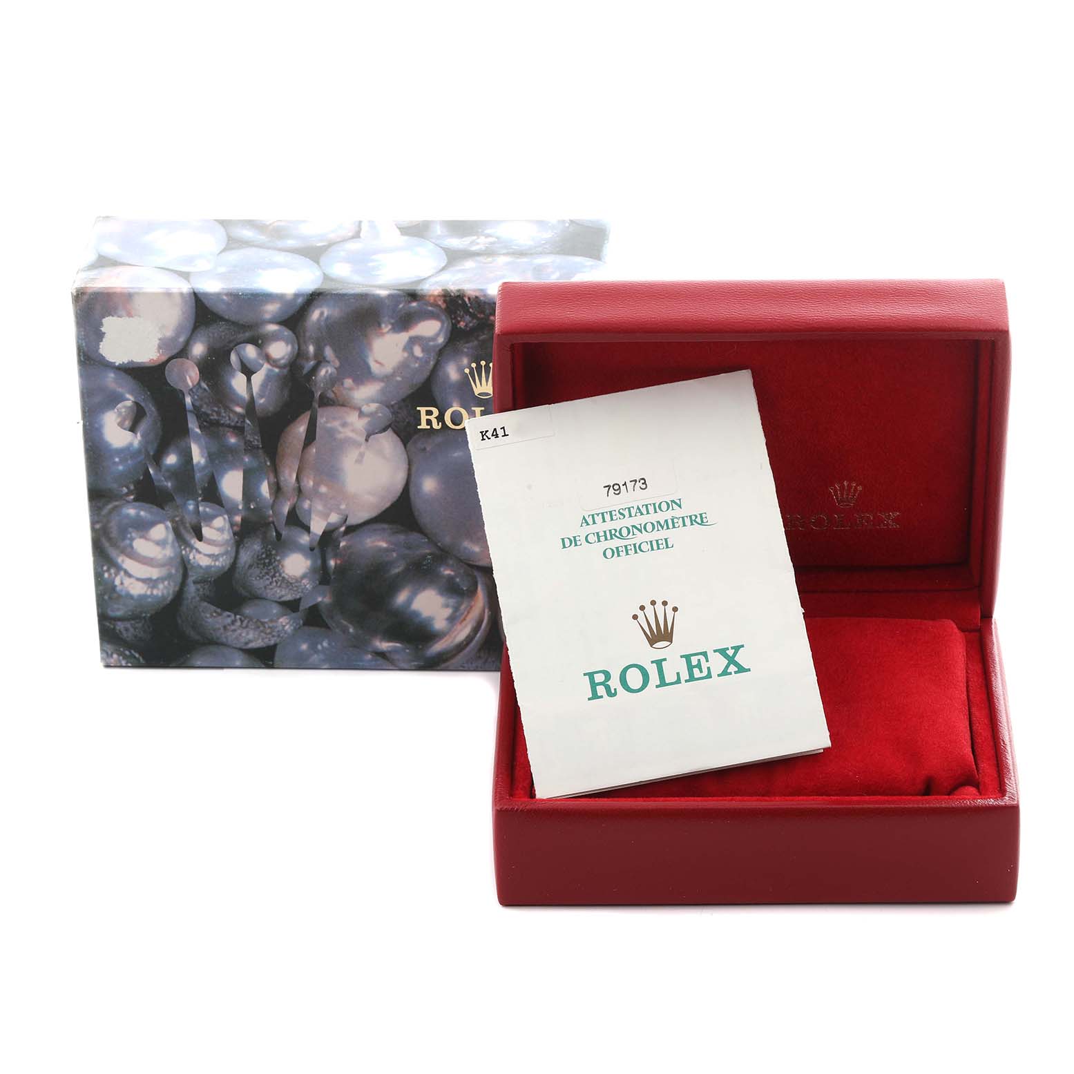 The image shows a Rolex Datejust 79173 Women's Steel and Gold (two tone) Champagne Dial 79173 Women's Steel and Gold (two tone) Champagne Dial box and papers, including a certificate and an outer decorative box.