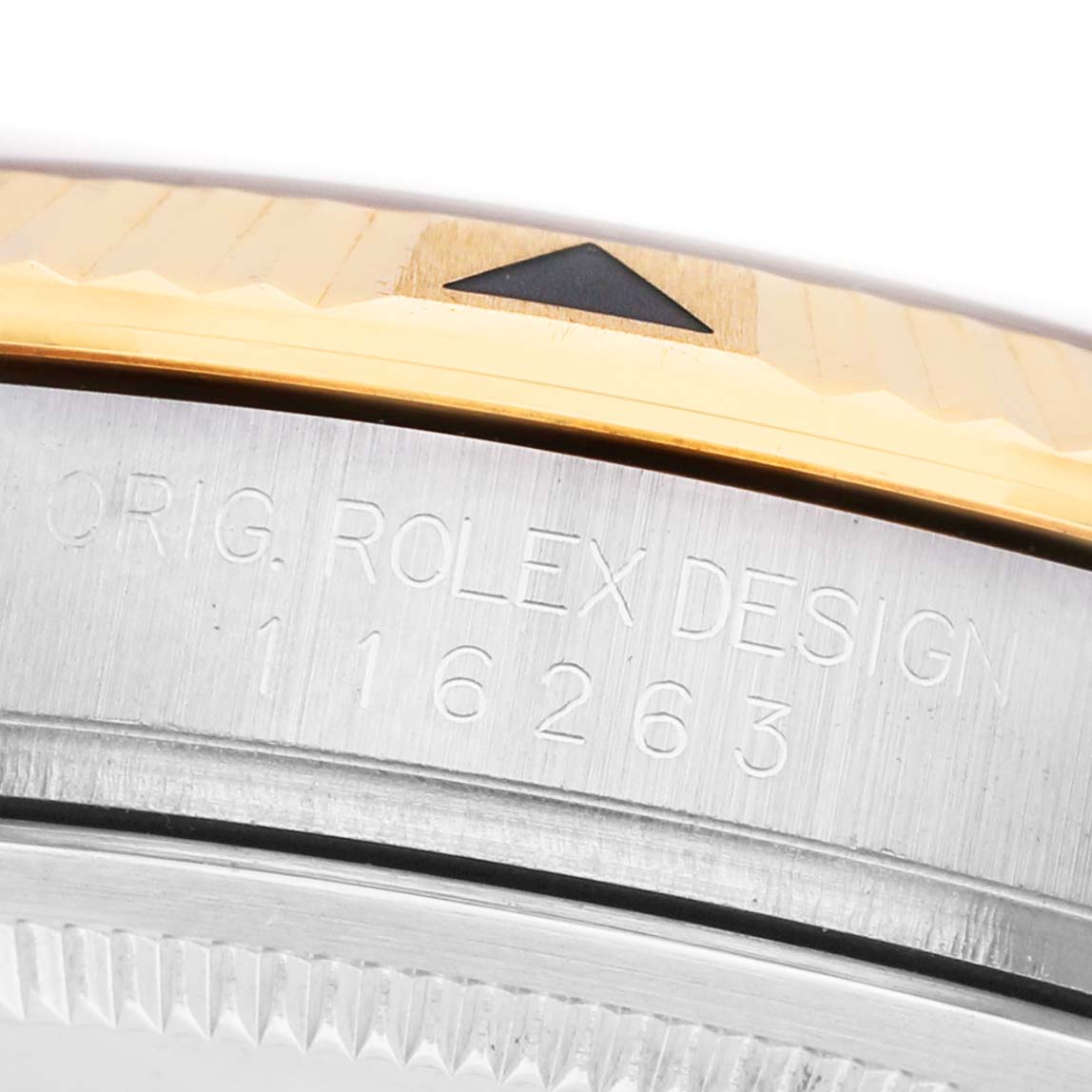The image shows the side of a Rolex Turn-o-Graph 116263 Men's Steel and Gold (two tone) Champagne Dial watch, highlighting the engraved model number and bezel detail.