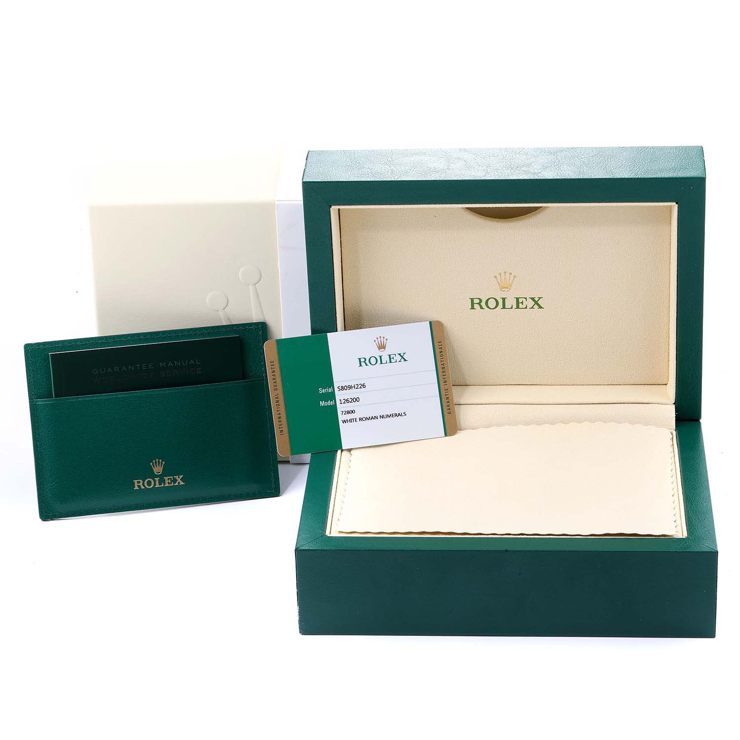 This image shows the packaging, guarantee manual, and warranty card for a Rolex Datejust 126200 Men's Stainless Steel White Dial 126200 Men's Stainless Steel White Dial model watch.