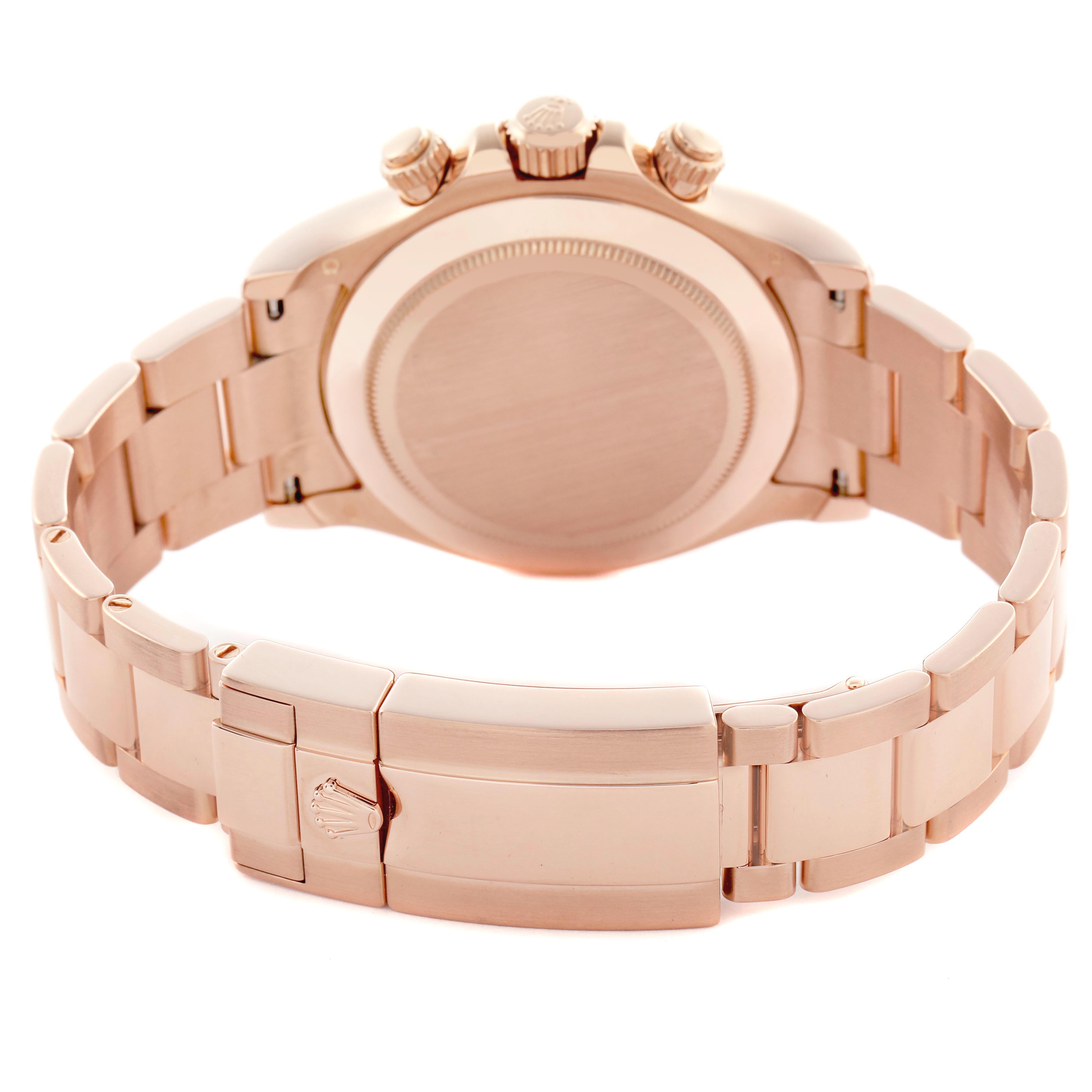 The image shows the back view of the Rolex Daytona 116505 Men's Rose Gold Black Dial 116505 Men's Rose Gold Black Dial, highlighting the case back and bracelet clasp.