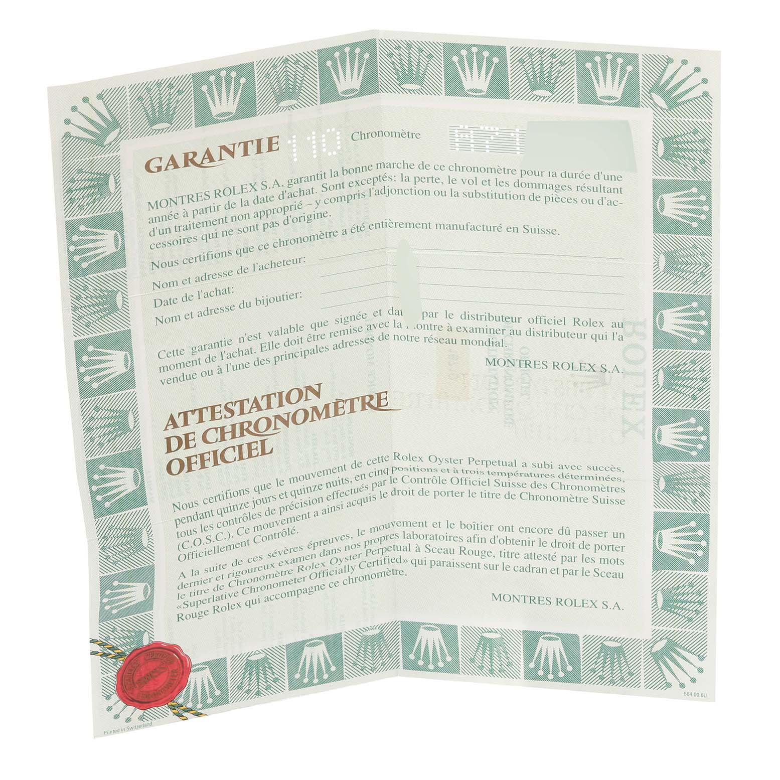 This image is of an unfolded warranty certificate for a Rolex GMT-Master 16710 Men's Stainless Steel Black Dial 16710 Men's Stainless Steel Black Dial watch, featuring green borders and printed text.