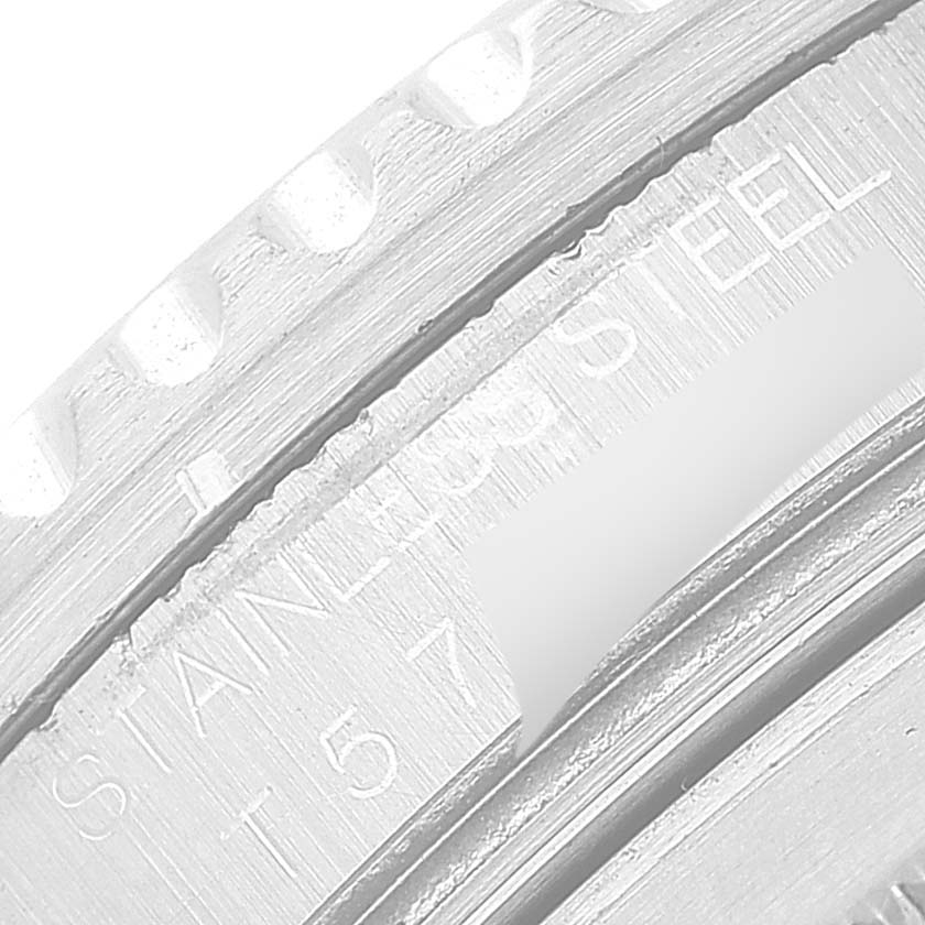 The image shows a close-up of the bezel and edge of the casing on a Rolex GMT-Master 16710 Men
s Stainless Steel Black Dial 16710 Men
s Stainless Steel Black Dial watch, focusing on the engraved text.