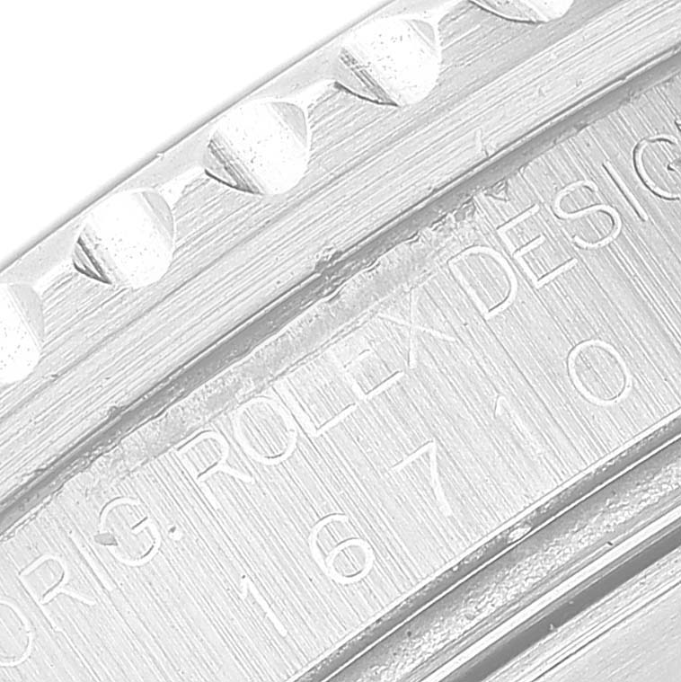 This close-up image shows the engraved edge of a Rolex GMT-Master 16710 Men
s Stainless Steel Black Dial 16710 Men
s Stainless Steel Black Dial with the model number 16710.