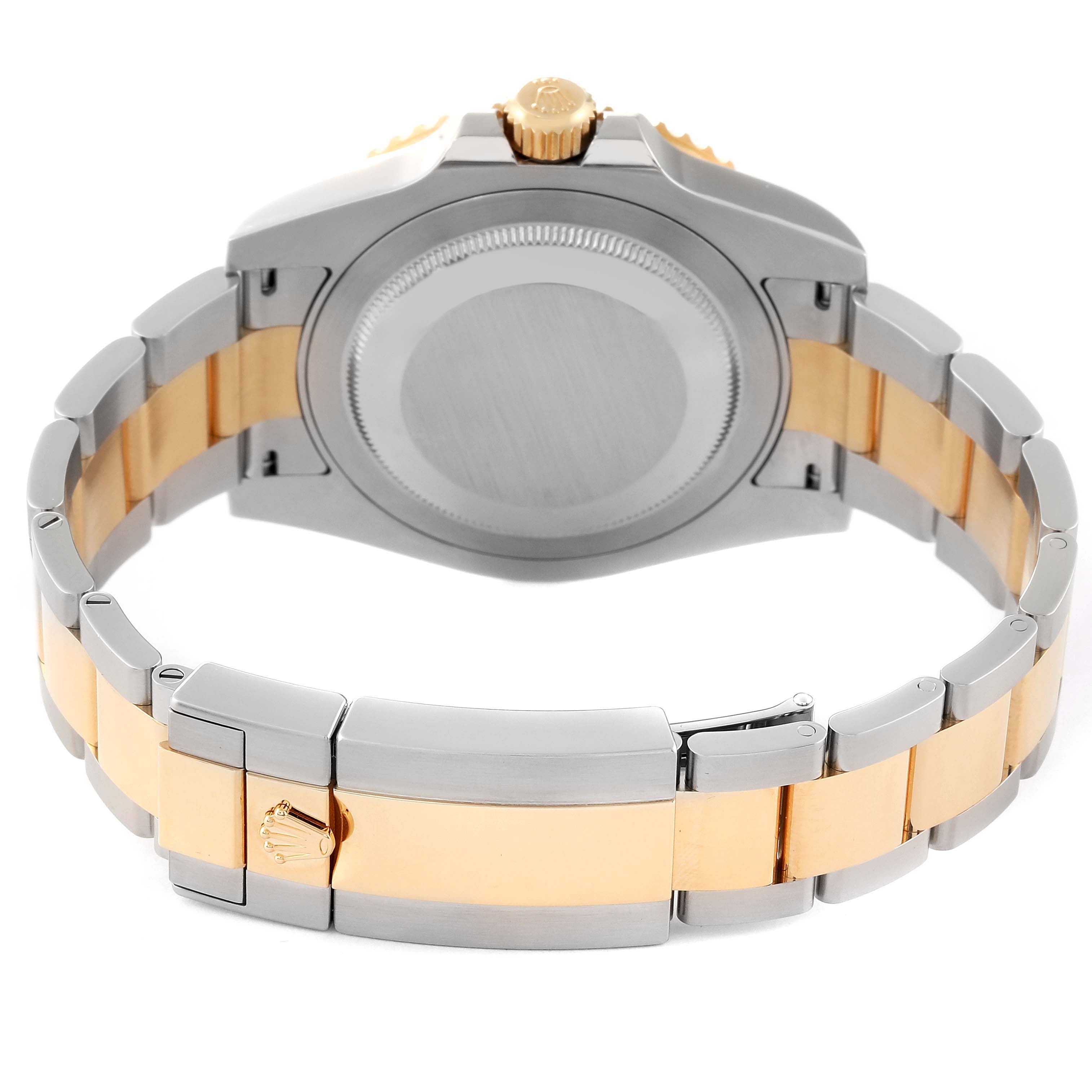 This image shows the back case and bracelet of a Rolex GMT-Master 116713 Men
s Steel and Gold (two tone) Black Dial 116713 Men
s Steel and Gold (two tone) Black Dial watch at a rear angle.