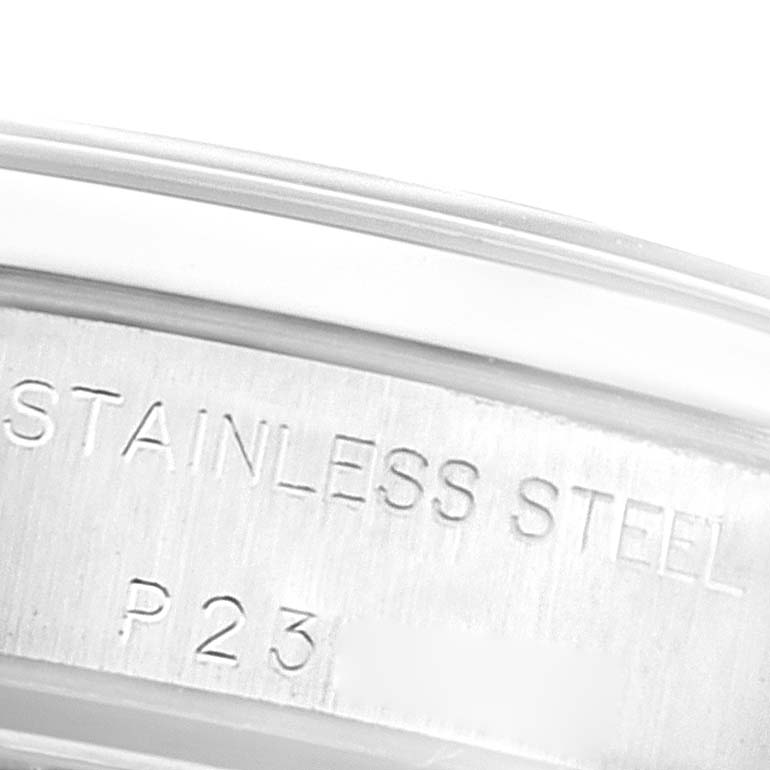 The image shows a close-up of the stainless steel case back of a Rolex Oyster Perpetual 76080 Women's Stainless Steel Blue Dial 76080 Women's Stainless Steel Blue Dial watch.