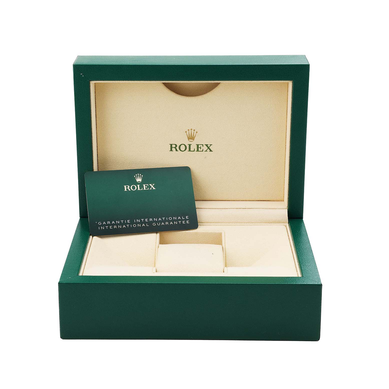 The image shows an open green and beige Rolex box with a warranty card for the Oyster Perpetual model.