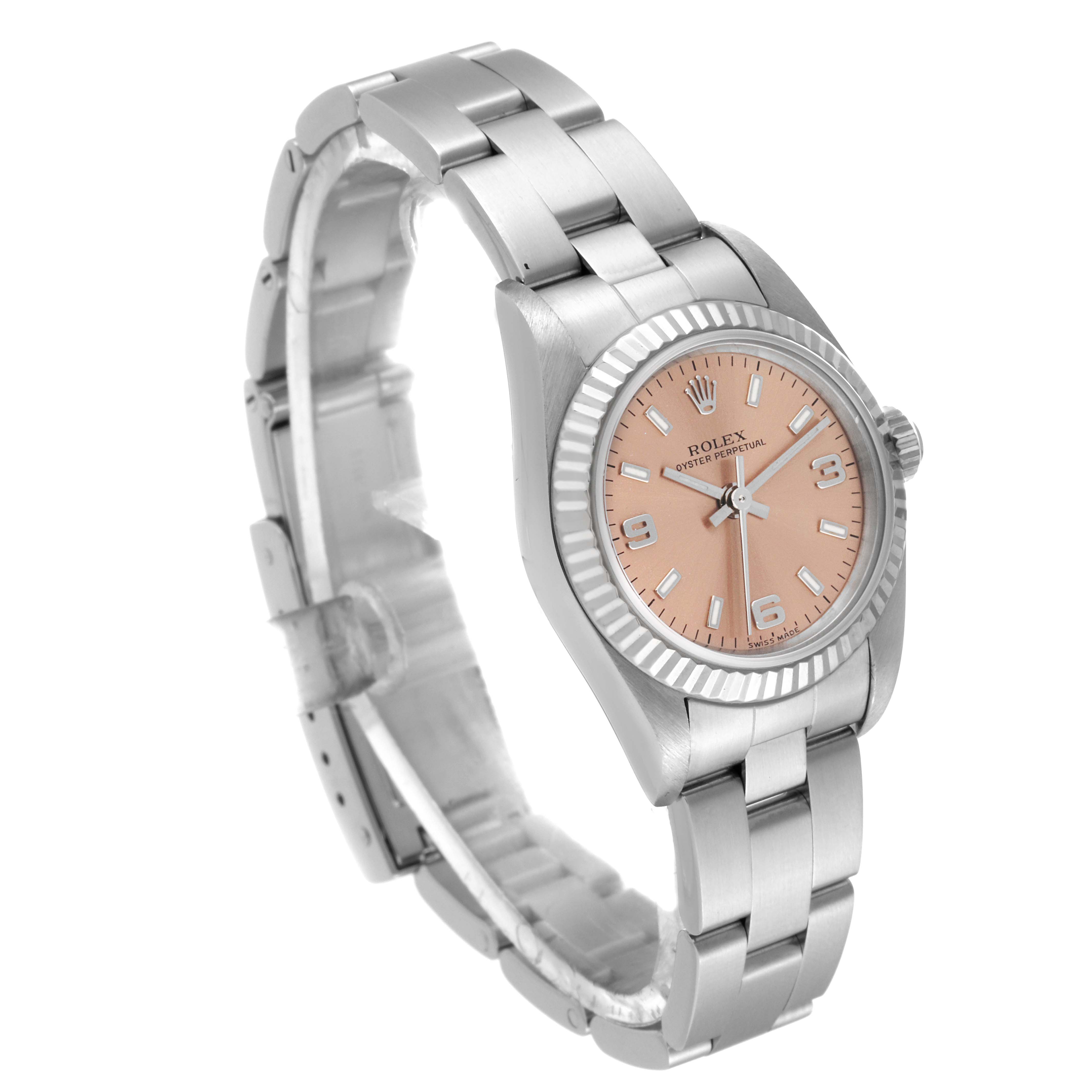 The Rolex Oyster Perpetual 76094 Women
s Stainless Steel Pink Dial 76094 Women
s Stainless Steel Pink Dial watch is shown at an angled side view, showcasing its bracelet, case, crown, and pink dial.