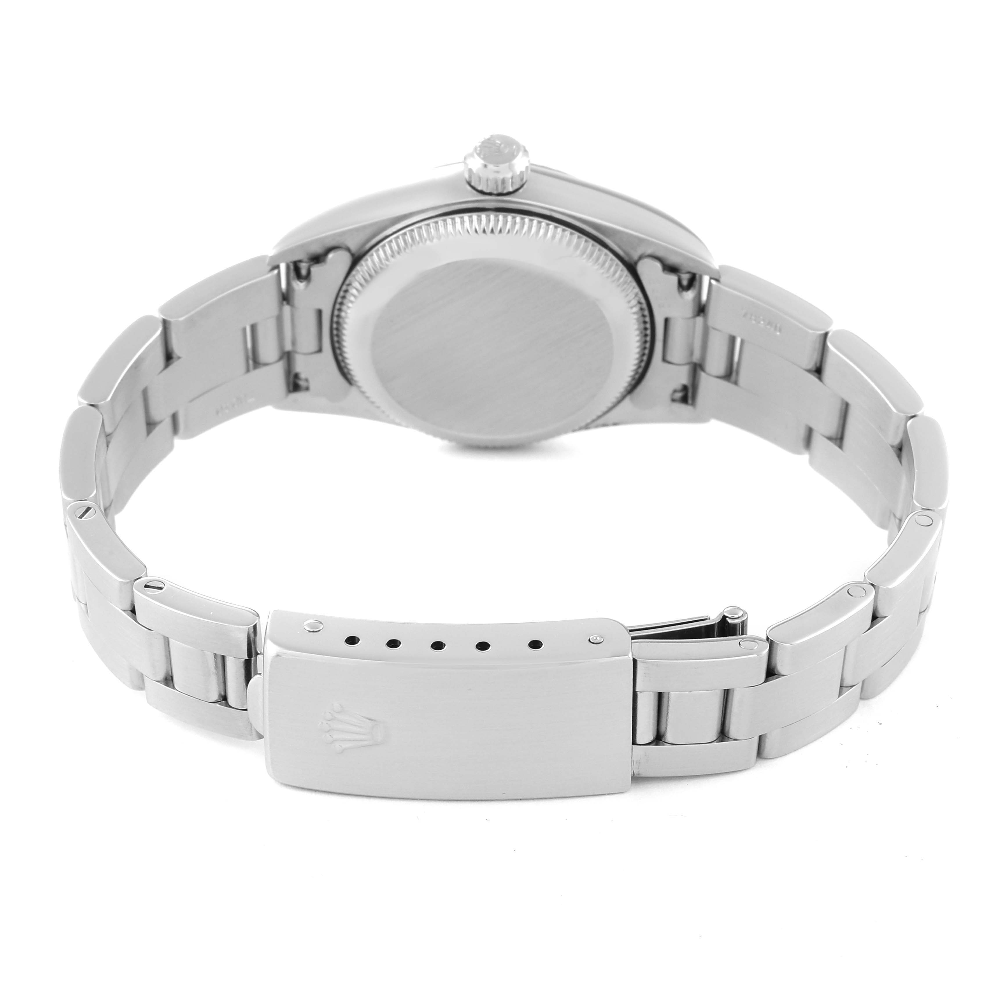 This image shows the case back, crown, and clasp of the Rolex Oyster Perpetual 76094 Women
s Stainless Steel Pink Dial 76094 Women
s Stainless Steel Pink Dial watch from a rear angle.