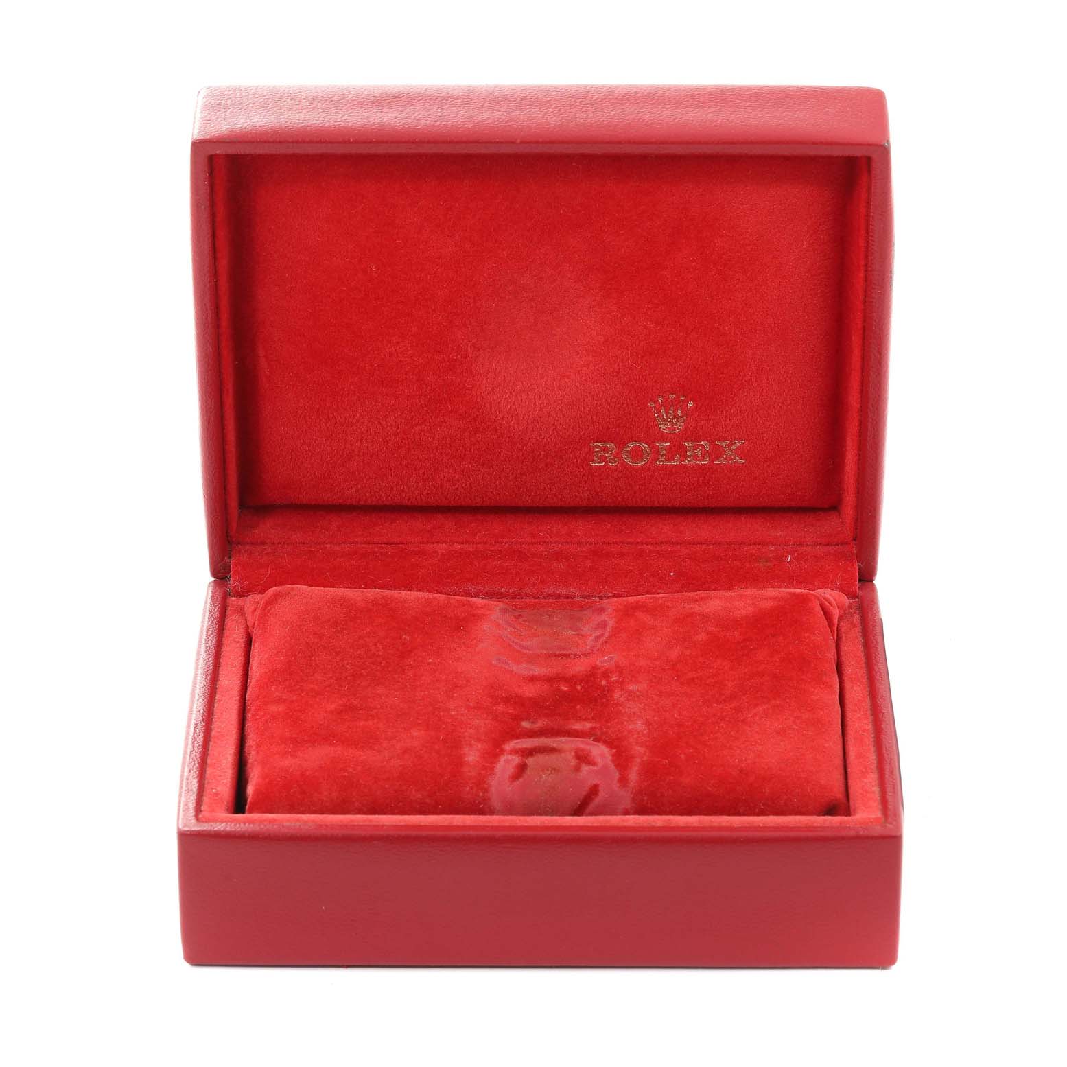 This image shows an open red Rolex watch box, likely for an Oyster Perpetual model, with a red velvet interior.