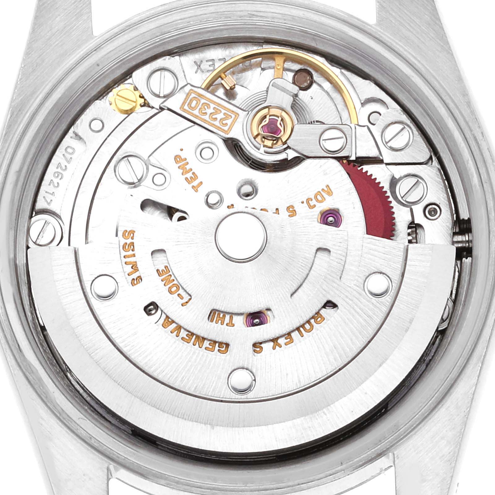 The image shows the internal mechanism of a Rolex Oyster Perpetual 76094 Women
s Stainless Steel Pink Dial 76094 Women
s Stainless Steel Pink Dial watch from a back angle.