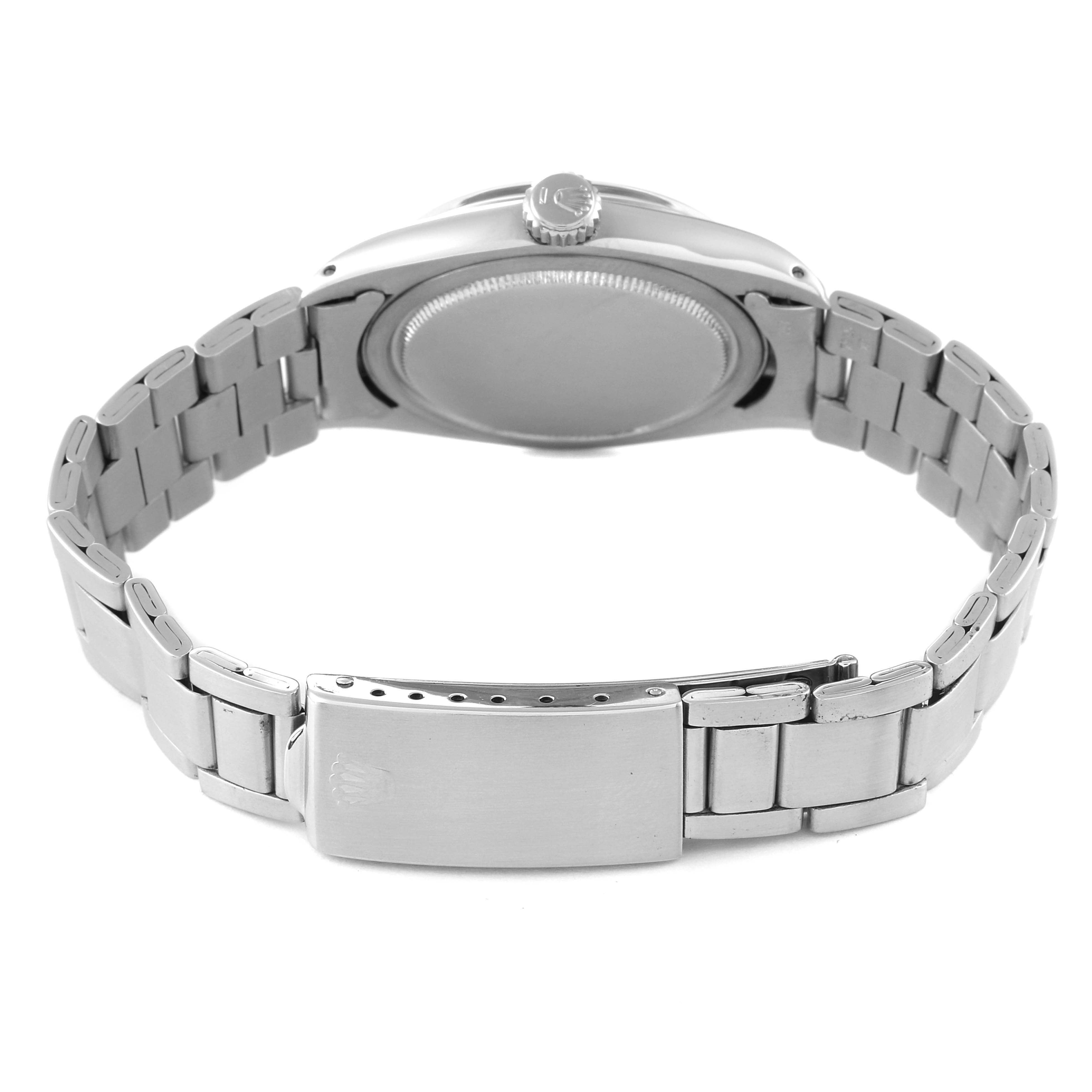The Rolex Vintage Collection 6426 Men's Stainless Steel Silver Dial 6426 Men's Stainless Steel Silver Dial watch is shown from the back, highlighting the wristband, clasp, and case back.