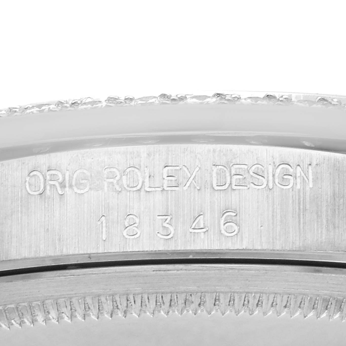 The image shows a close-up of the edge of a Rolex President 18346 Men's Platinum Silver Dial 18346 Men's Platinum Silver Dial model, highlighting the engraved design number.