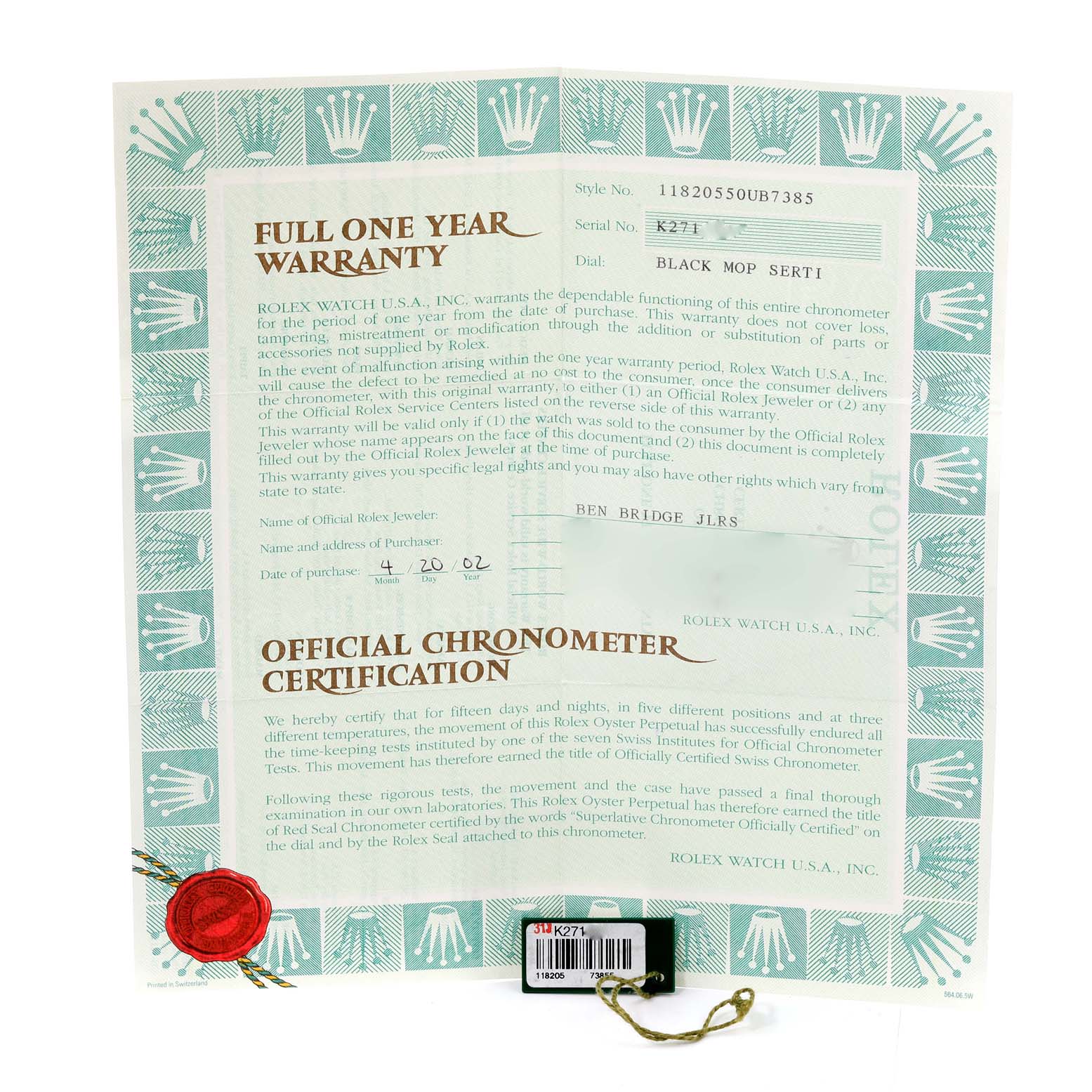 The image shows documentation for a Rolex President 118205 Men's Rose Gold Mother of Pearl Dial 118205 Men's Rose Gold Mother of Pearl Dial model, including a warranty and certification, angled slightly from above.