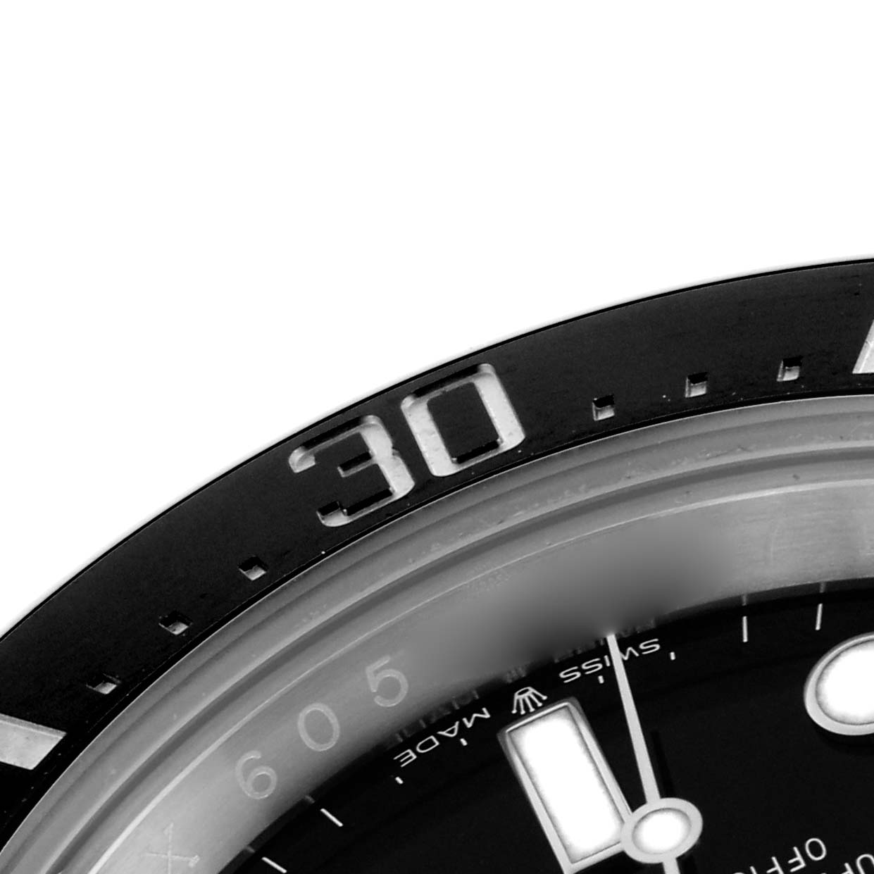 The image shows a close-up of the bezel and dial of a Rolex Sea-Dweller 126600 Men's Stainless Steel Black Dial 126600 Men's Stainless Steel Black Dial, focusing on the 30-minute mark.