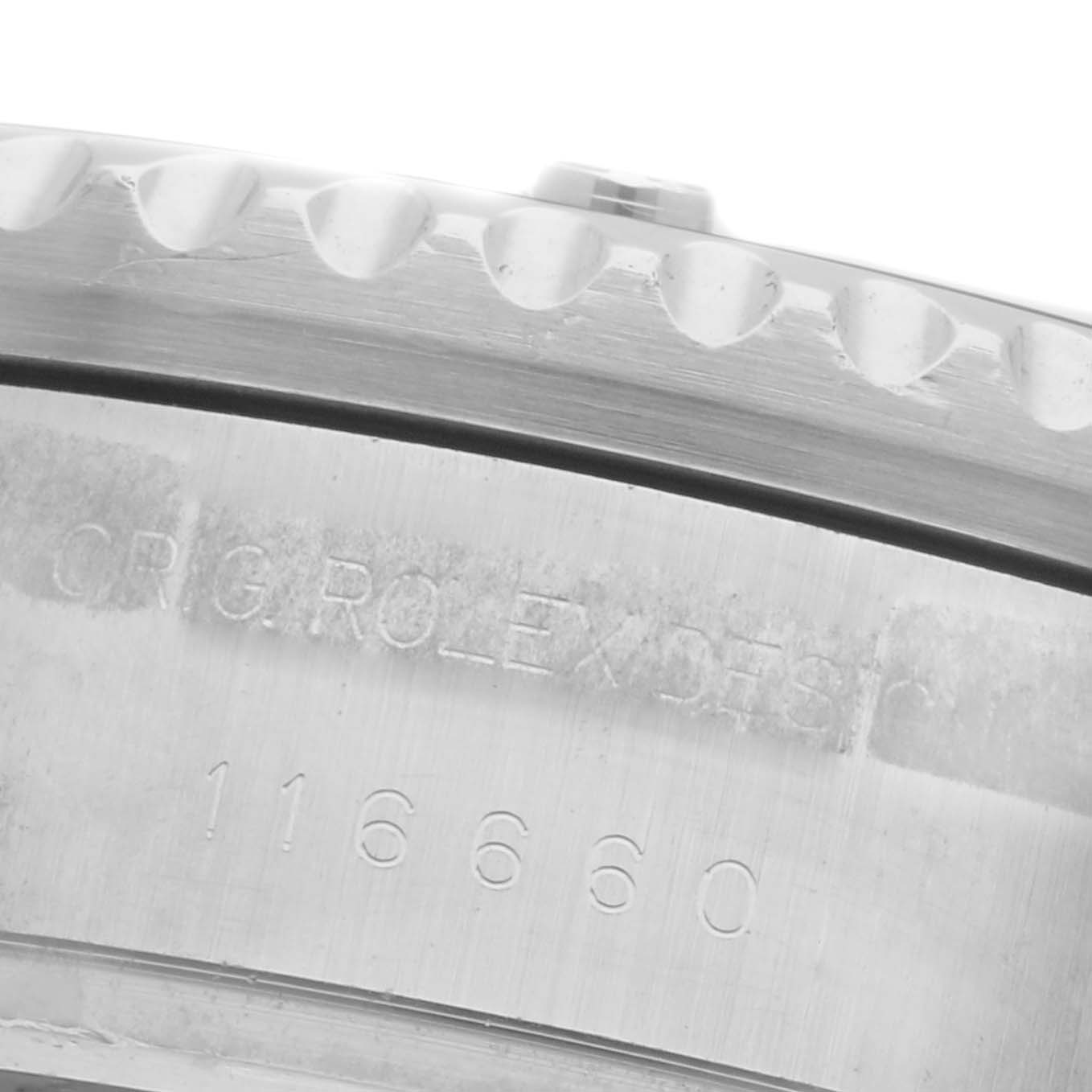 The image shows a close-up of the case side of a Rolex Sea-Dweller 116660 Men's Stainless Steel Black Dial 116660 Men's Stainless Steel Black Dial, highlighting the engraved writing and model number 116660.