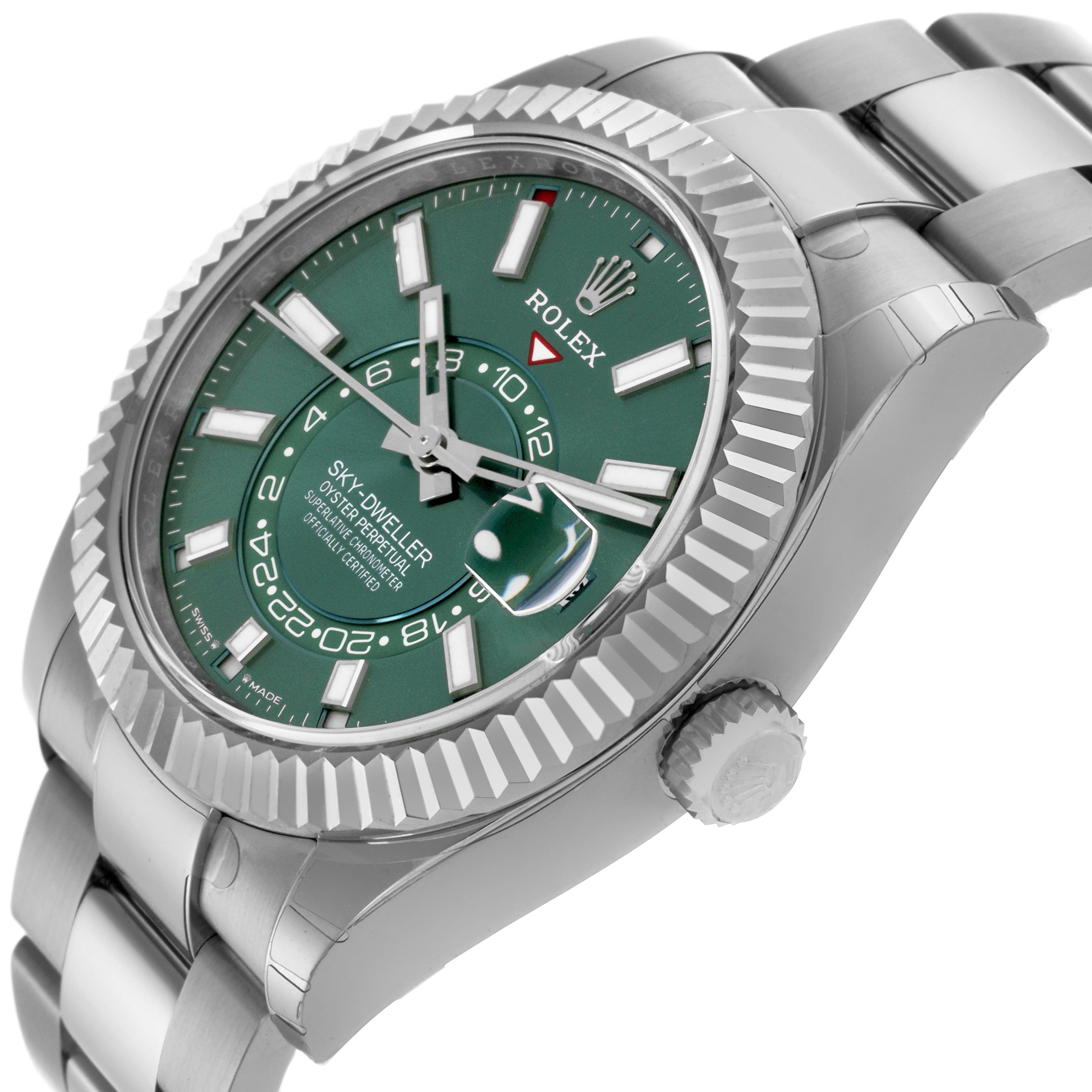 The Rolex Sky-Dweller 336934 Men's Stainless Steel Green Dial 336934 Men's Stainless Steel Green Dial watch is shown at a side angle, highlighting the green dial, fluted bezel, and partially visible bracelet.