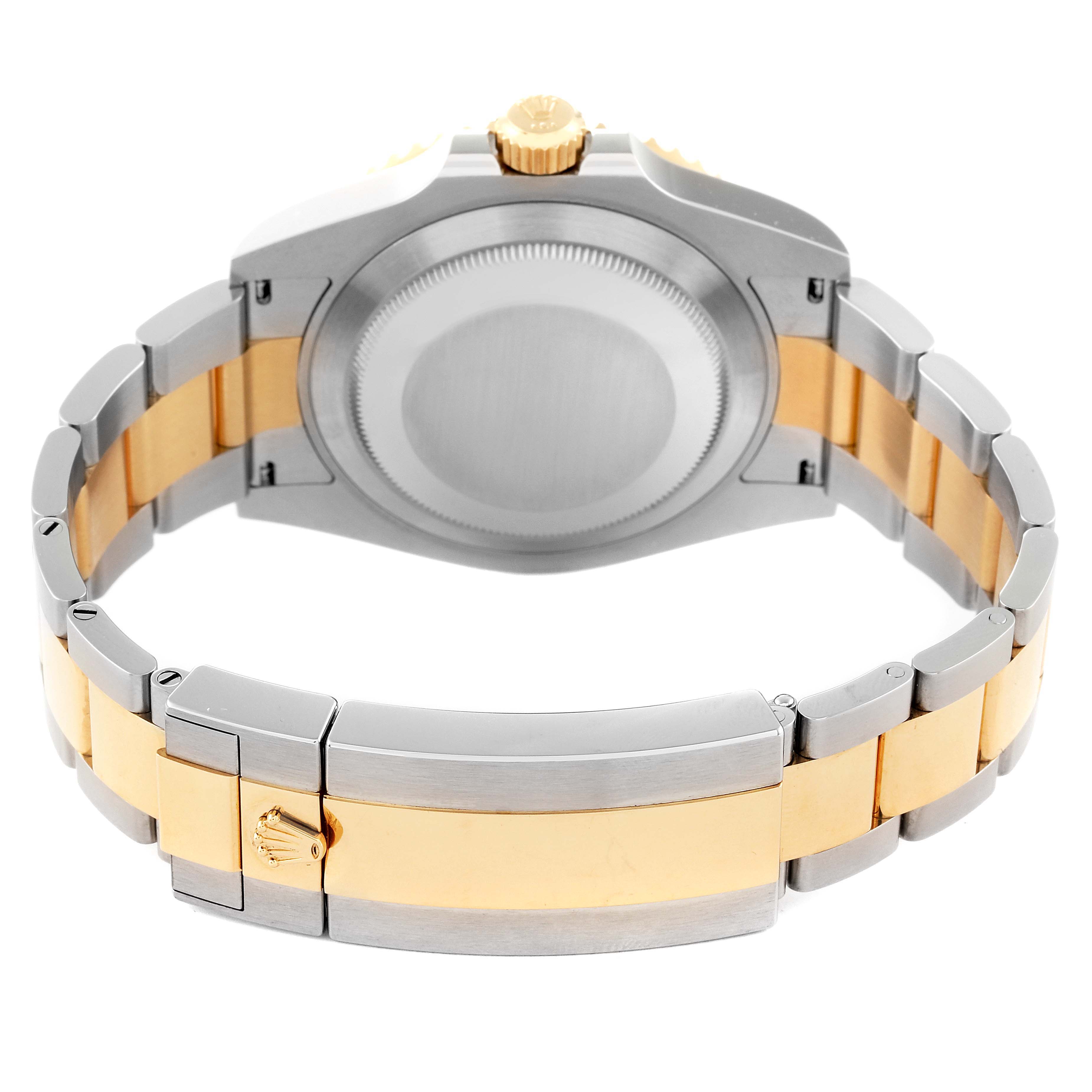 The Rolex Submariner 126613 Men's Steel and Gold (two tone) Black Dial 126613 Men's Steel and Gold (two tone) Black Dial watch is shown from the back, highlighting its case back, crown, and two-tone bracelet.