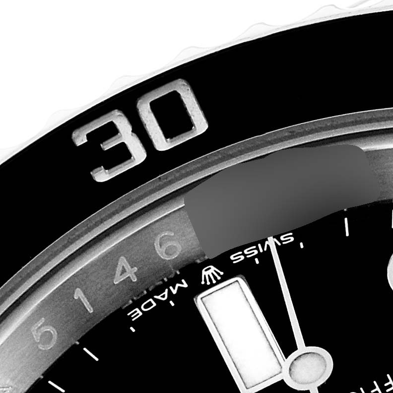 This close-up shows a part of the bezel and dial of the Rolex Submariner 126610 Men
s Stainless Steel Black Dial 126610 Men
s Stainless Steel Black Dial watch, featuring the number "30" on the bezel.