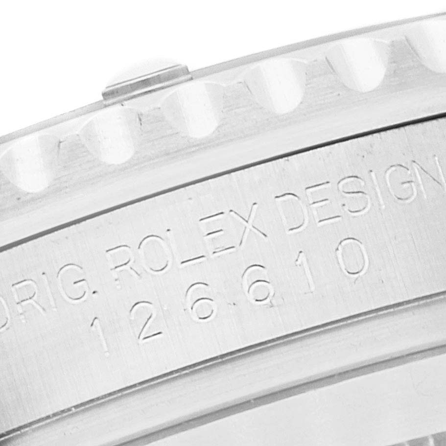 The image shows a close-up angle of the bezel and case of a Rolex Submariner 126610 Men
s Stainless Steel Black Dial 126610 Men
s Stainless Steel Black Dial model, revealing the model number "126610."