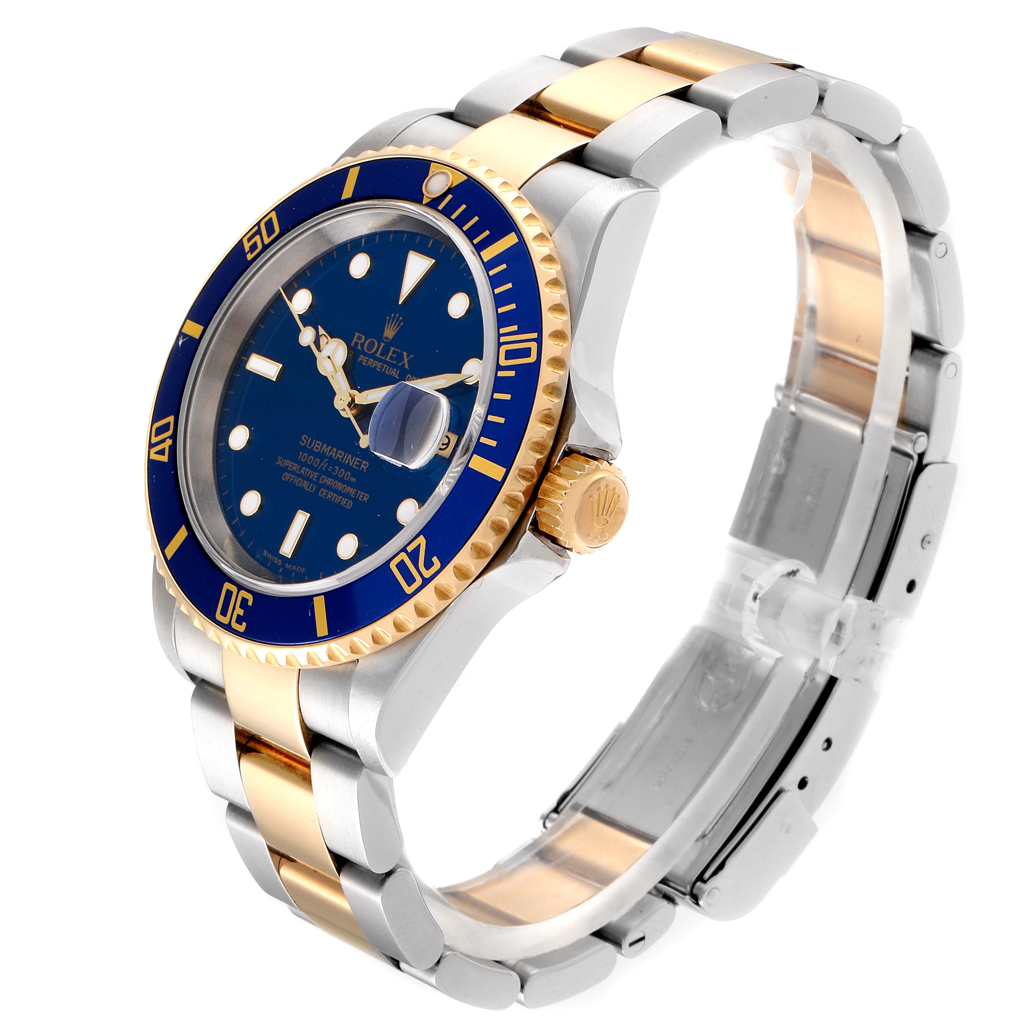 The image shows a Rolex Submariner 16613 Men
s Steel and Gold (two tone) Blue Dial 16613 Men
s Steel and Gold (two tone) Blue Dial watch at an angle displaying its blue dial, bezel, crown, and two-tone bracelet.
