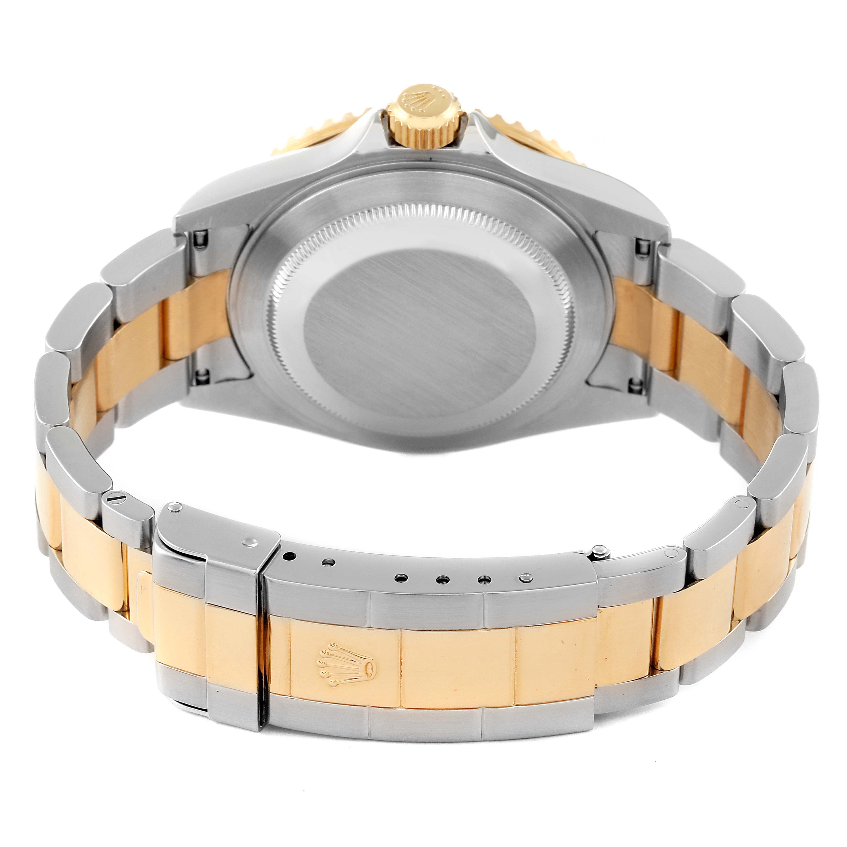 The image shows the back view of the Rolex Submariner 16613 Men's Steel and Gold (two tone) Blue Dial 16613 Men's Steel and Gold (two tone) Blue Dial watch, highlighting the bracelet, clasp, and case back.