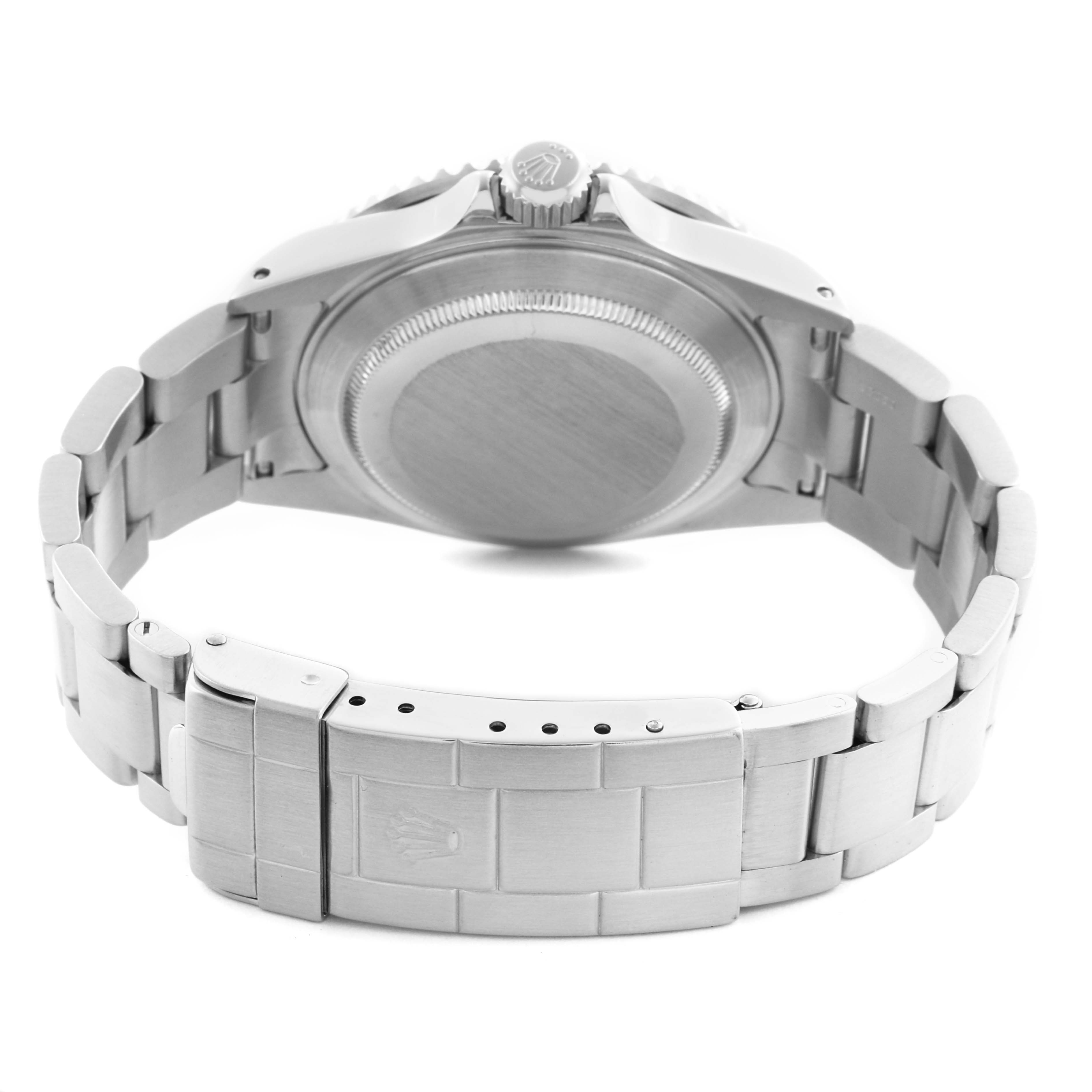 The image shows the back of a Rolex Submariner 16610 Men's Stainless Steel Black Dial 16610 Men's Stainless Steel Black Dial, focusing on the case back, bracelet, and clasp from a rear angle.