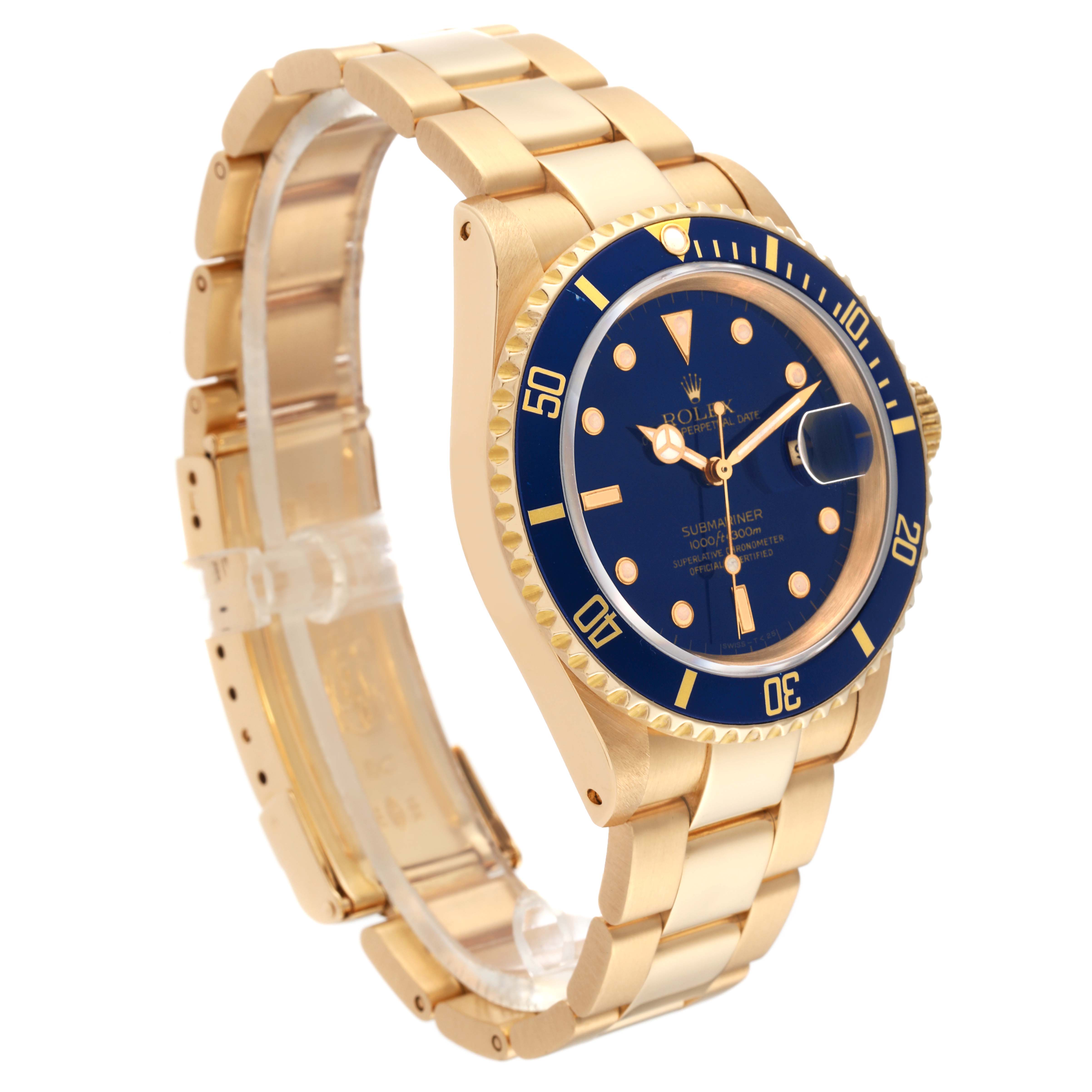The image shows a Rolex Submariner 16618 Men's Yellow Gold Blue Dial 16618 Men's Yellow Gold Blue Dial watch at a slightly tilted angle, highlighting the blue dial, bezel, and gold bracelet.