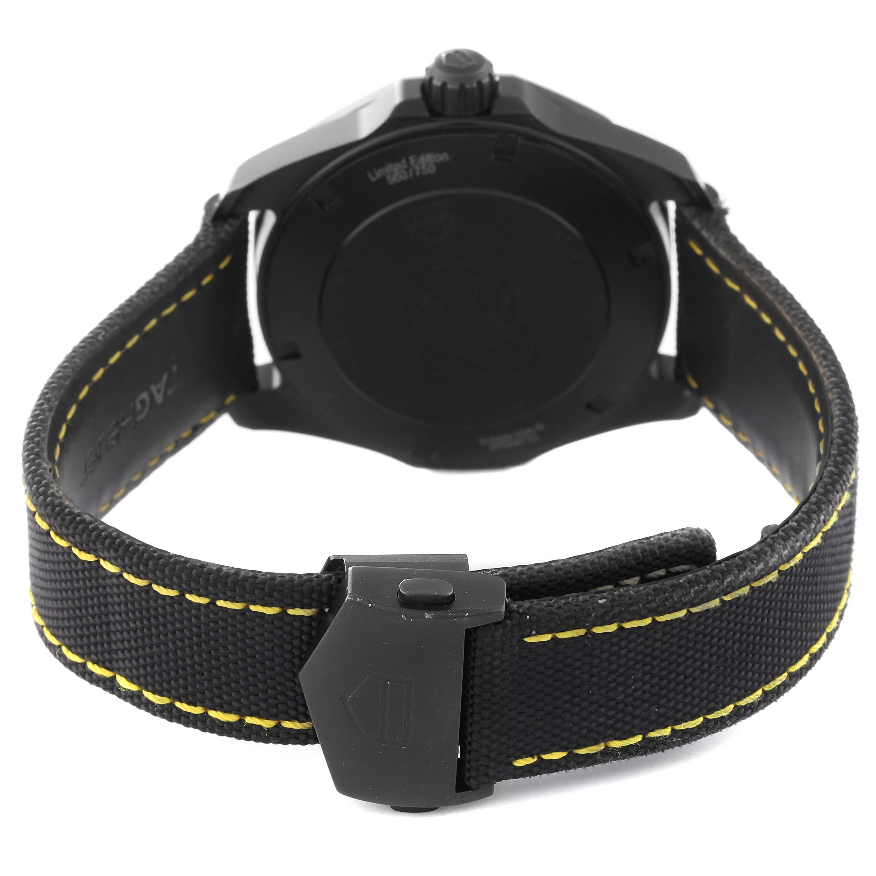 This is a rear view of a Tag Heuer Limited Edition WBD218A.FC6445 Men's Titanium Black Dial WBD218A.FC6445 Men's Titanium Black Dial watch, showing the back case, crown, and band with yellow stitching.