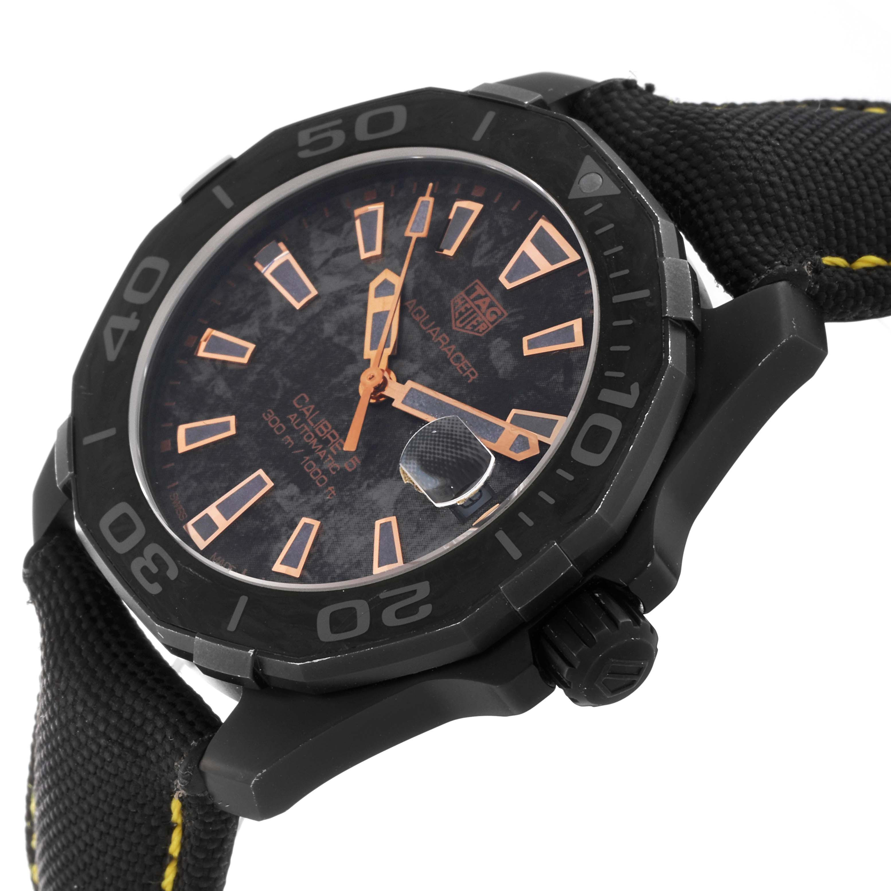 The image shows the face and part of the strap of the Limited Edition TAG Heuer Aquaracer watch at an angle.